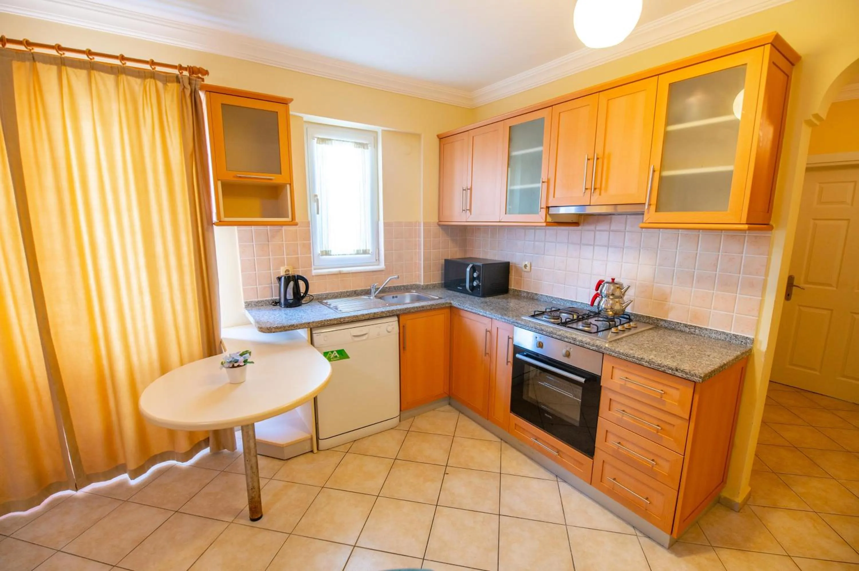 Kitchen or kitchenette in Sunset Beach Resort Aqua Lettings
