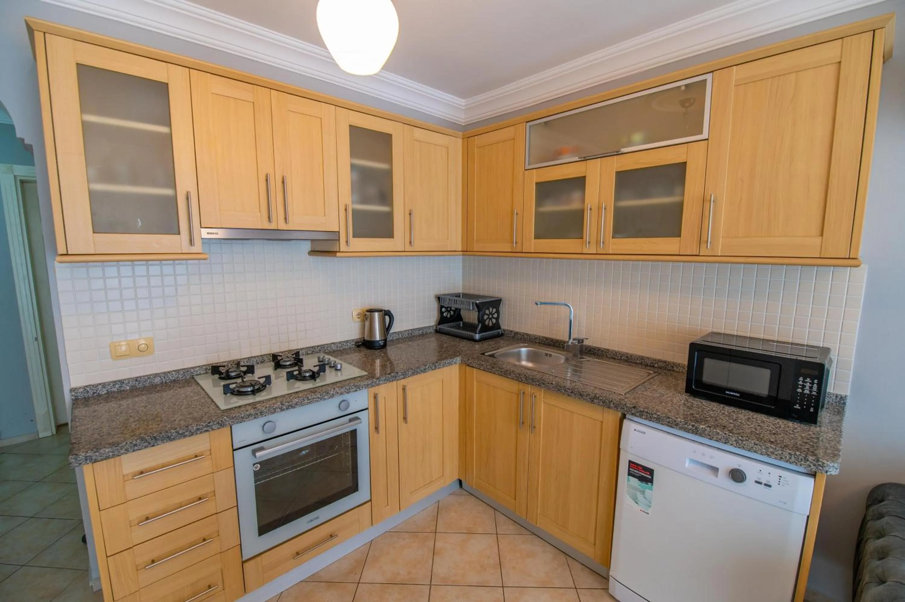 Kitchen or kitchenette in Sunset Beach Resort Aqua Lettings
