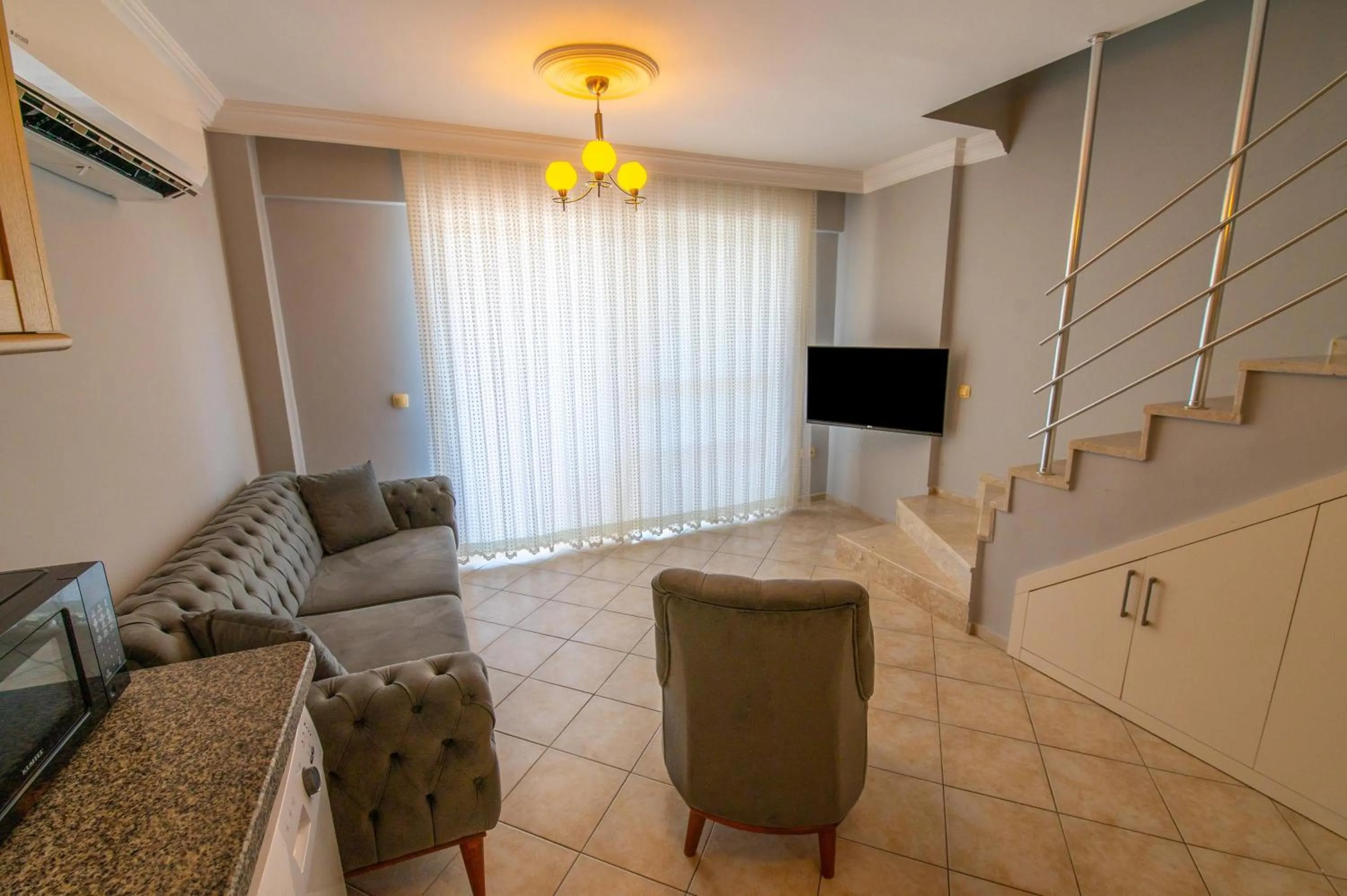 Communal lounge/ TV room in Sunset Beach Resort Aqua Lettings