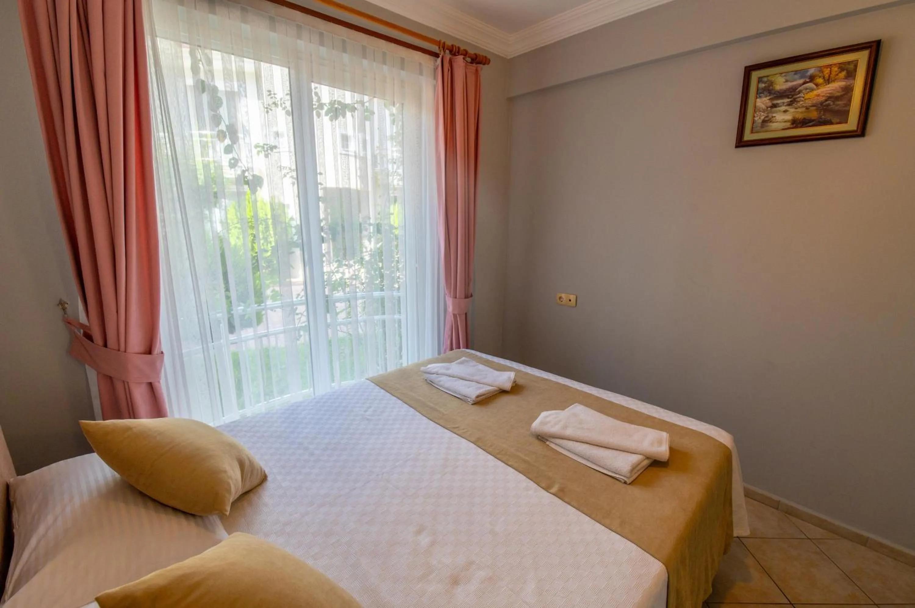 Bed in Sunset Beach Resort Aqua Lettings