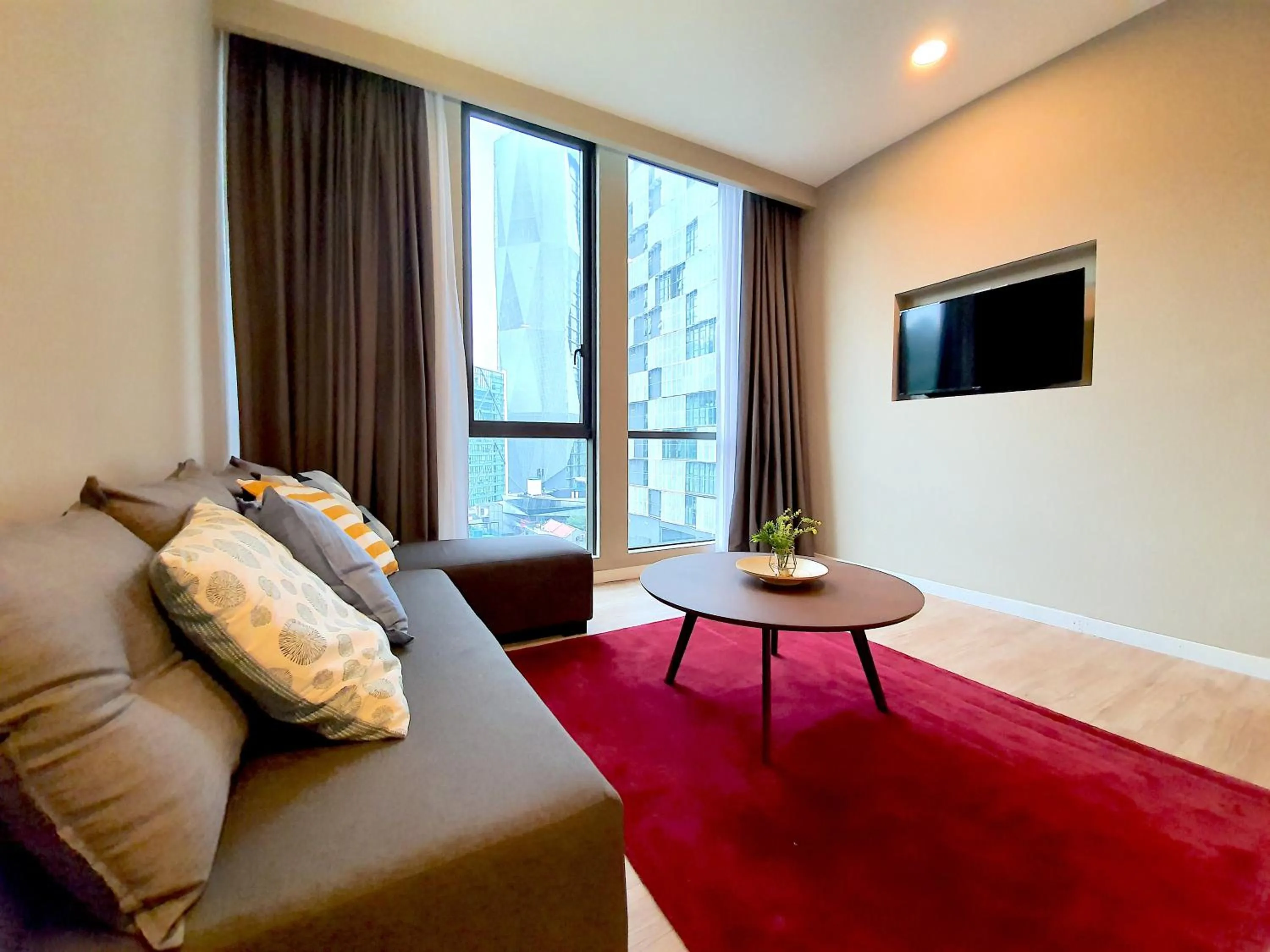 Living room, Bed in Empire Damansara Hotel Suites by Beestay