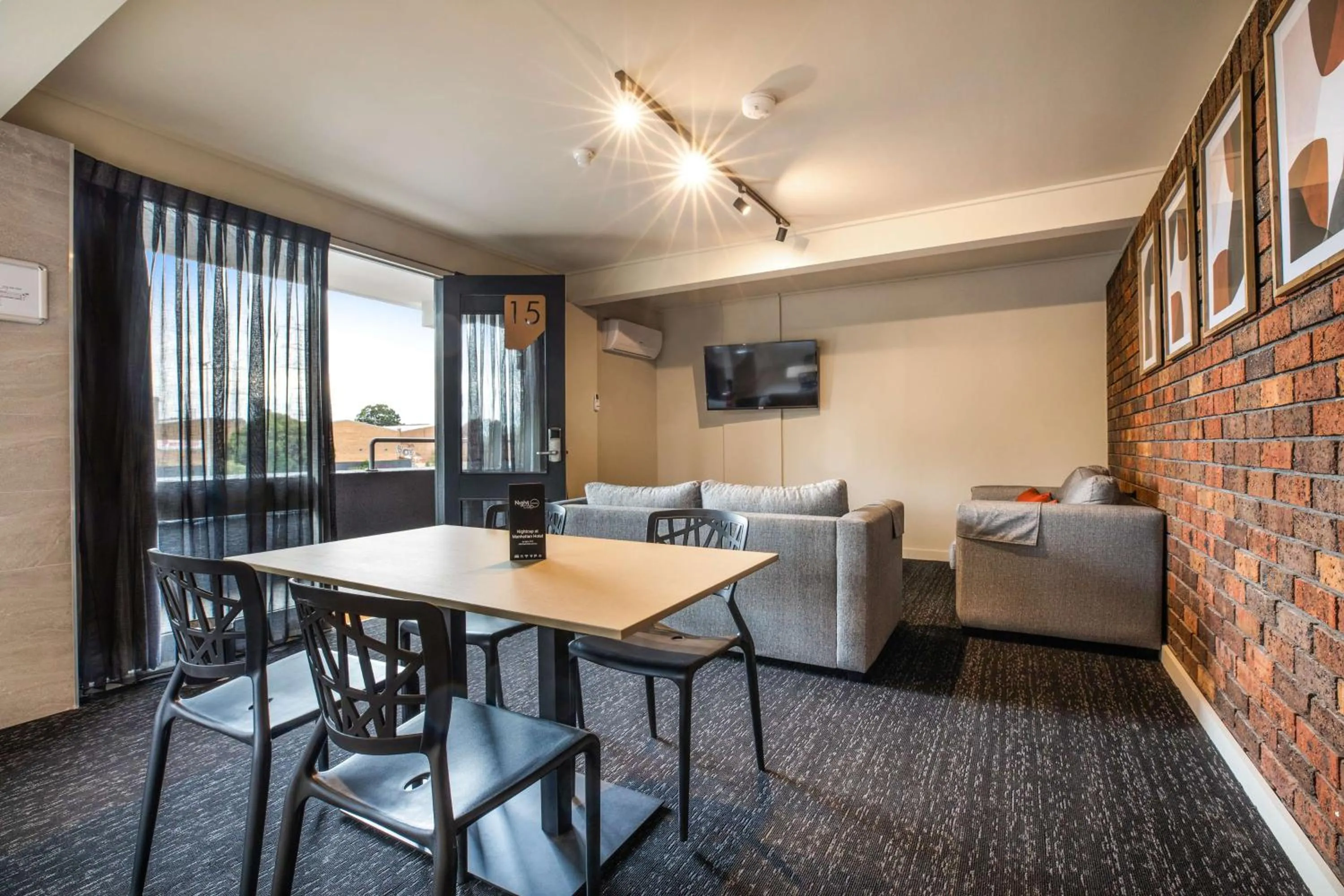 Bedroom in Nightcap at Manhattan Hotel