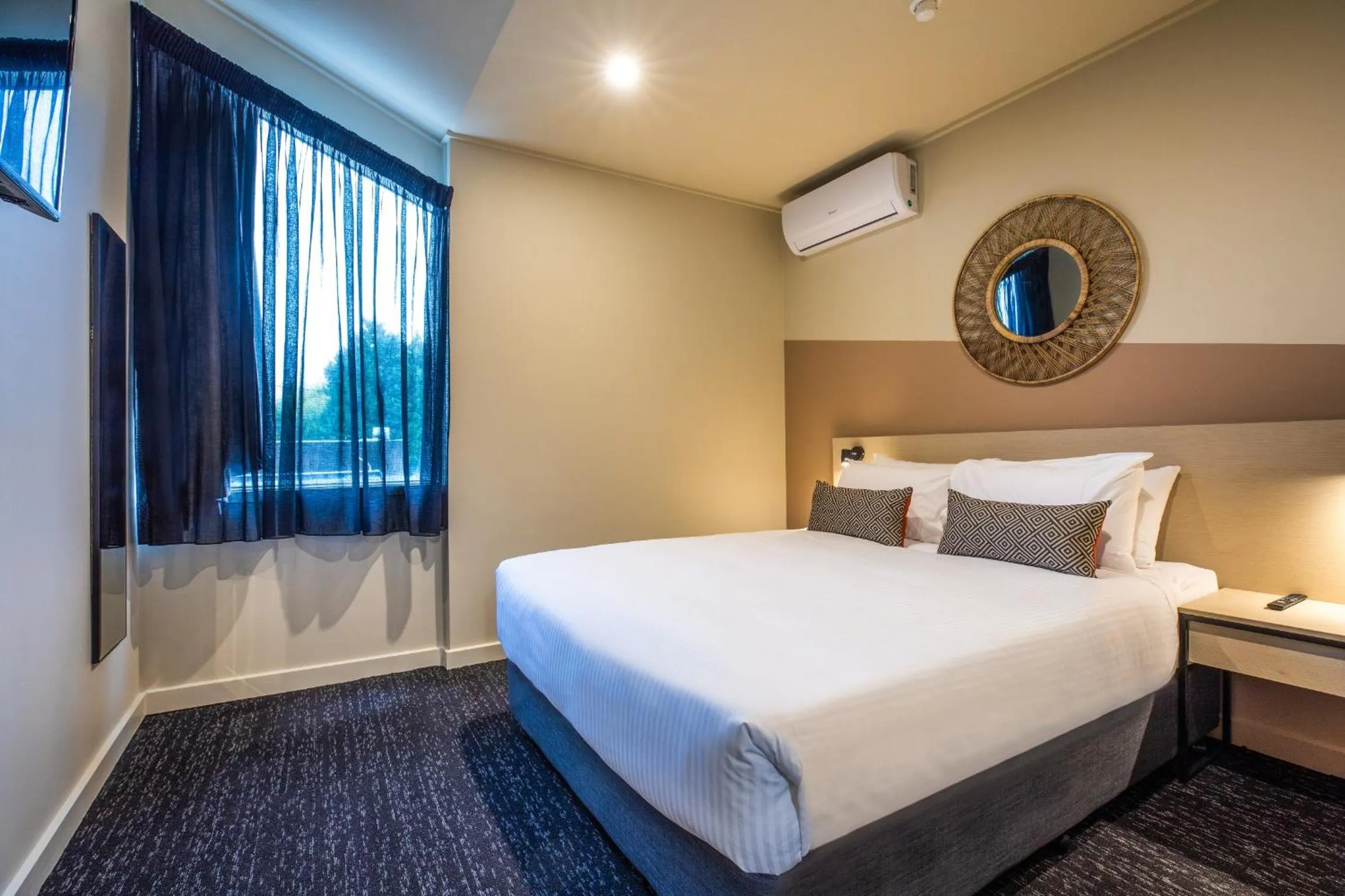 Bed in Nightcap at Manhattan Hotel