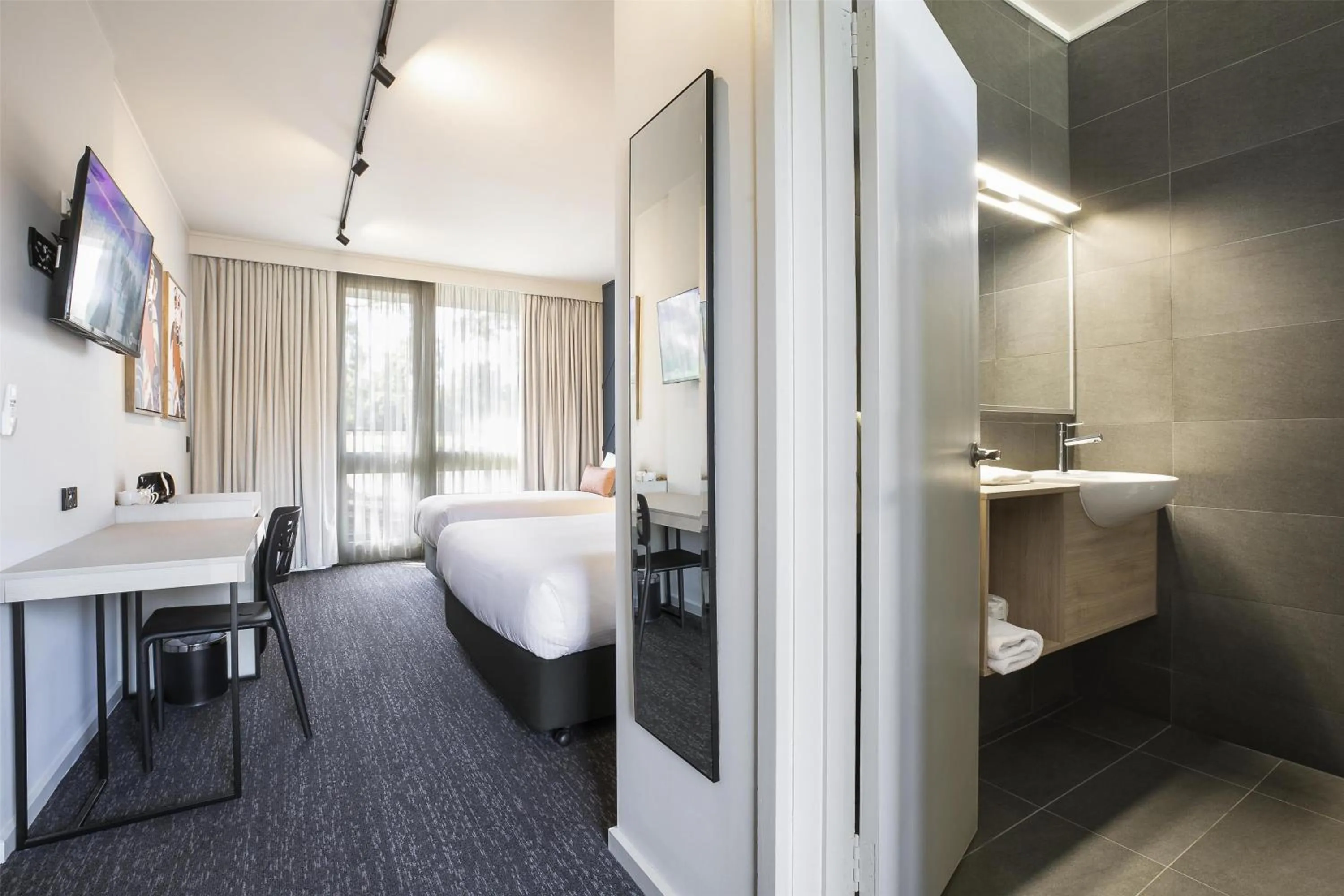 Bedroom, Bed in Nightcap at Sandown Park Hotel