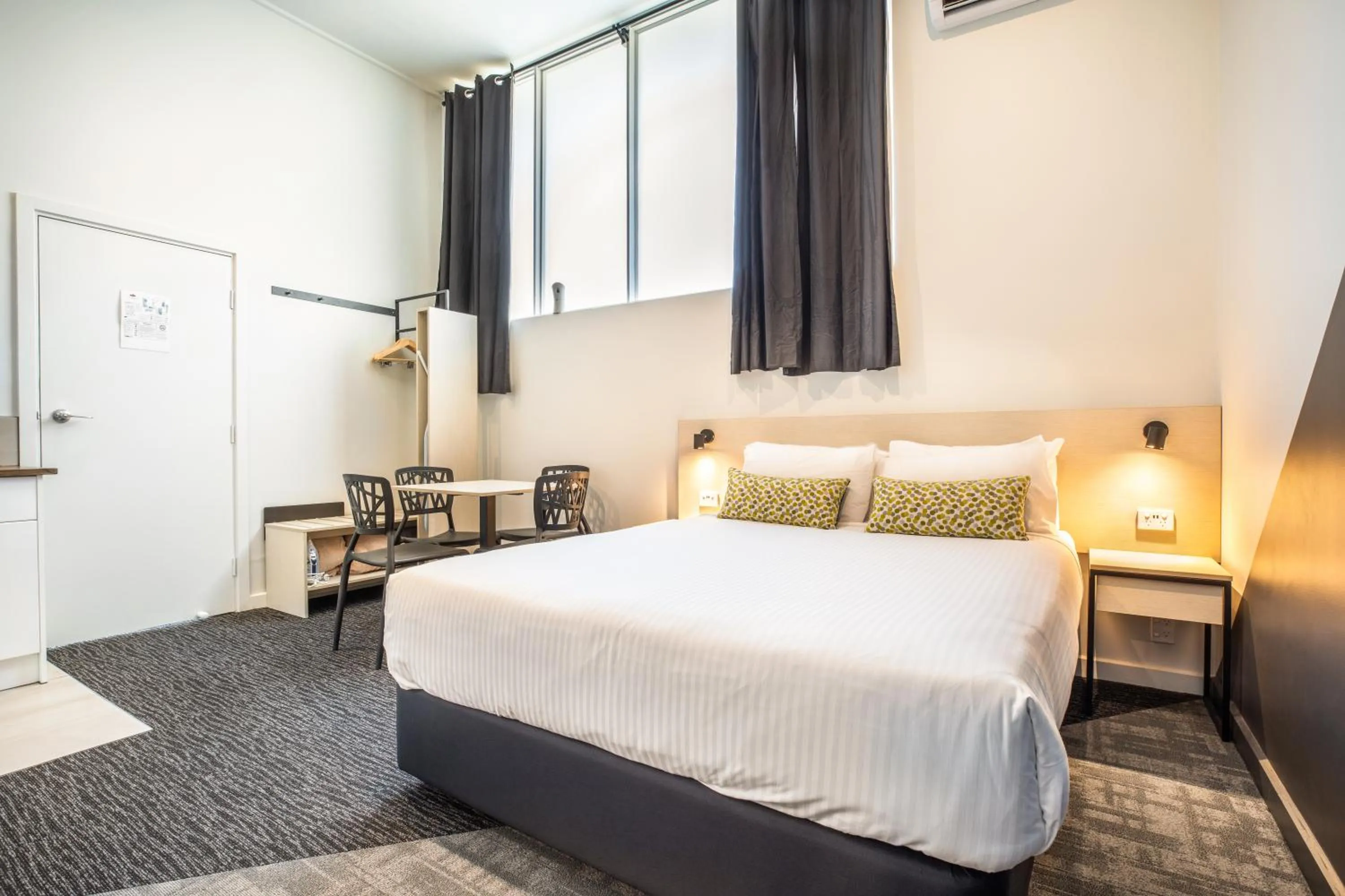 Bedroom, Bed in Nightcap at Seaford Hotel