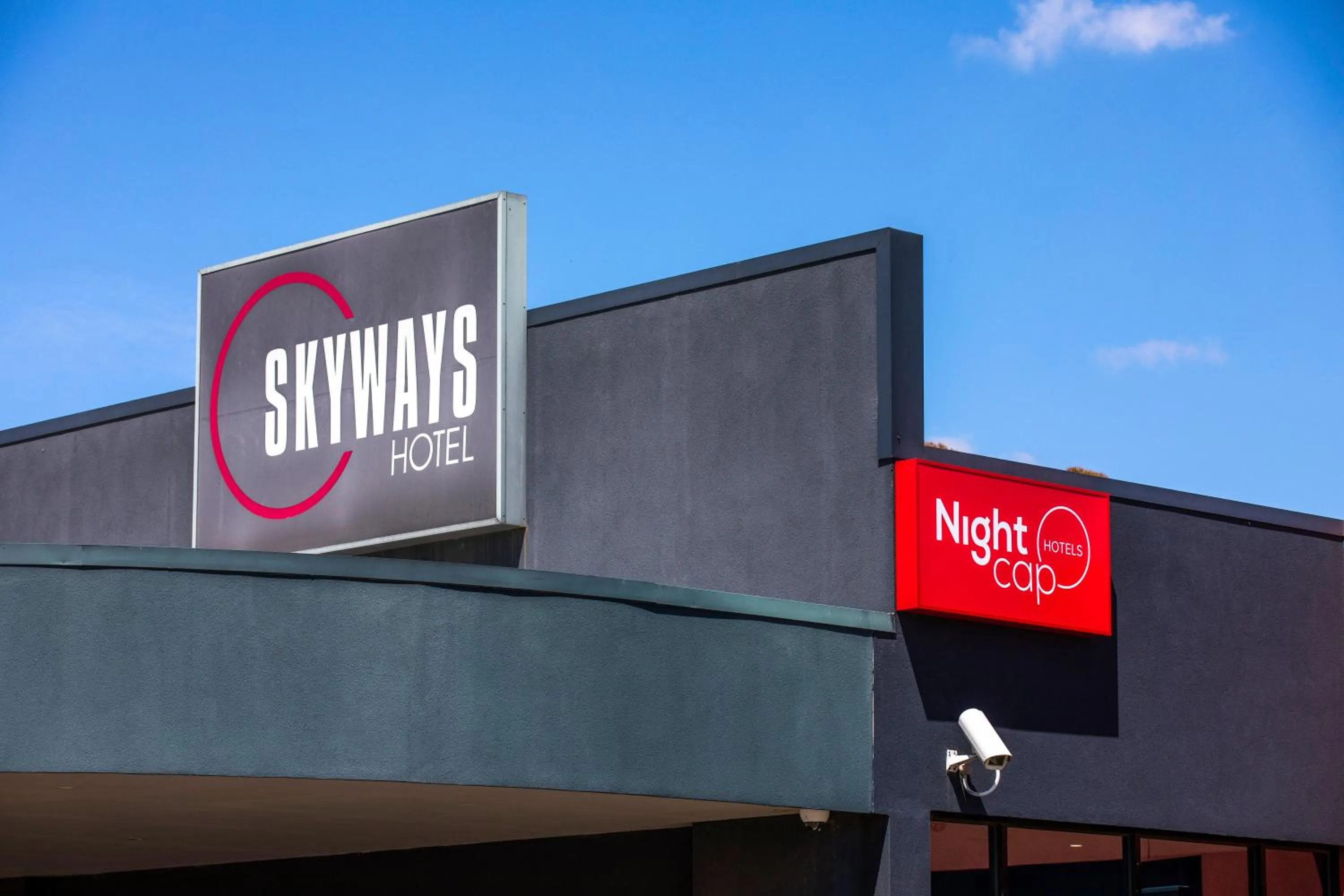 Property logo or sign in Nightcap at Skyways Hotel