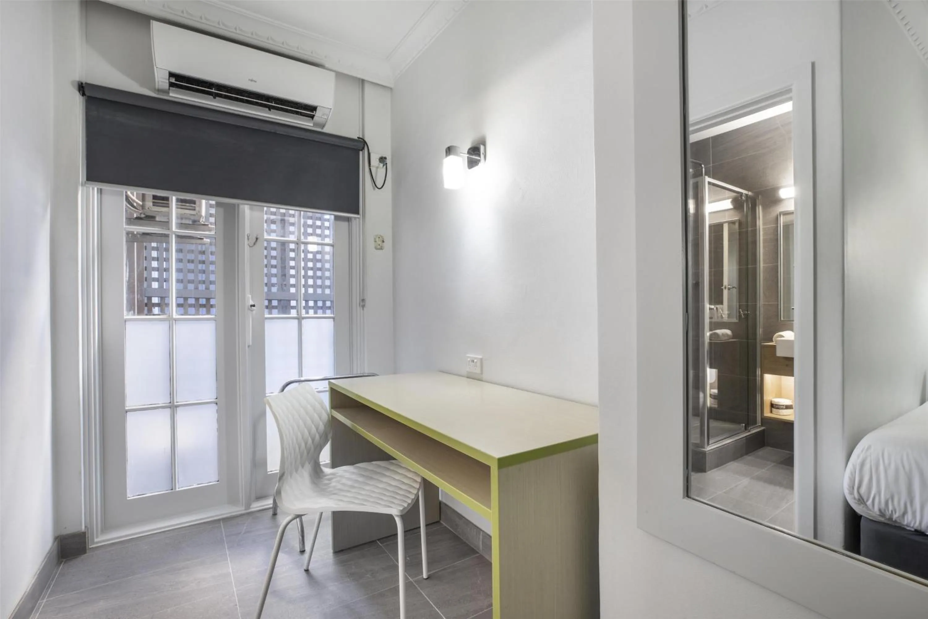 Bedroom, Bed in Nightcap at Skyways Hotel