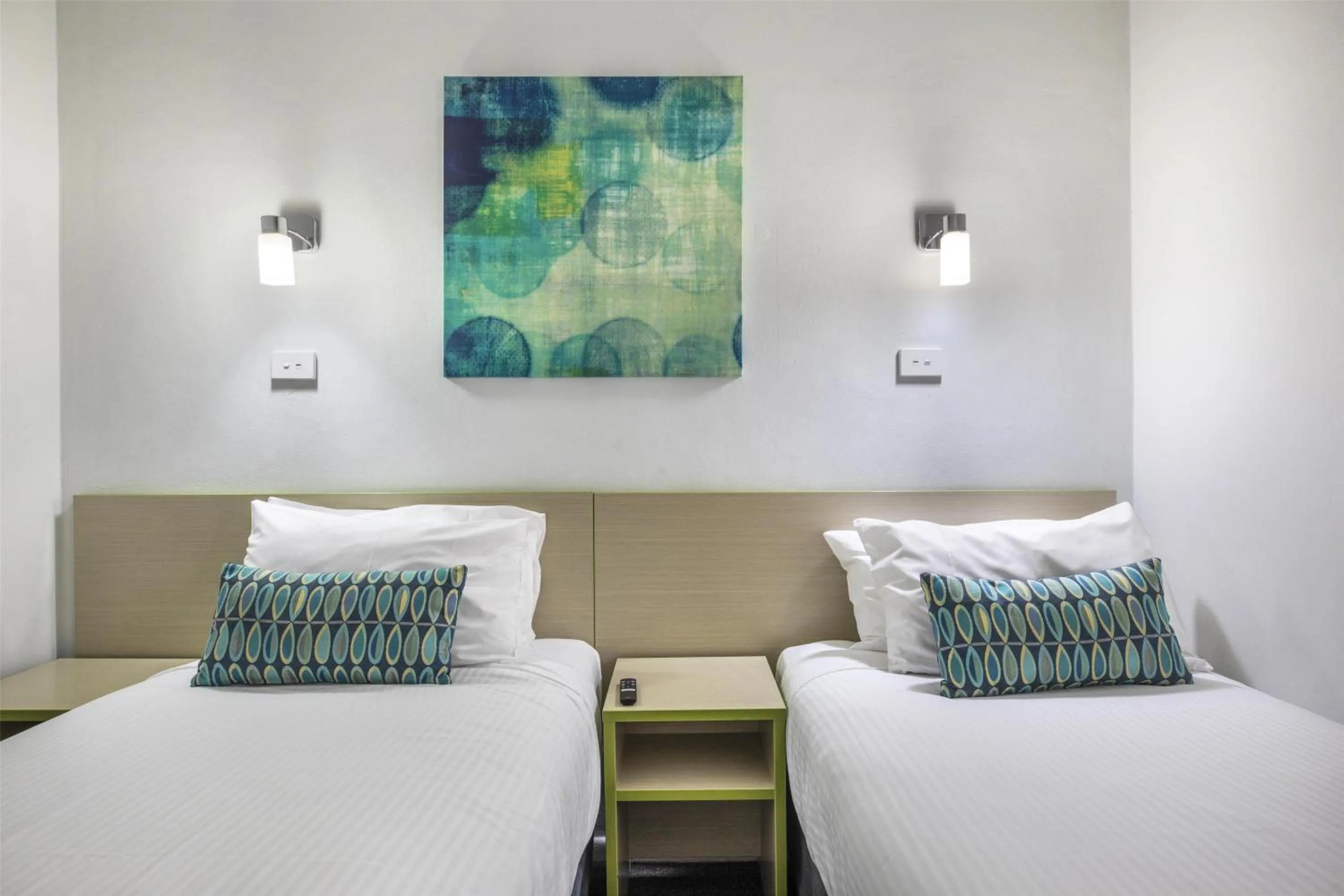 Bedroom, Bed in Nightcap at Skyways Hotel