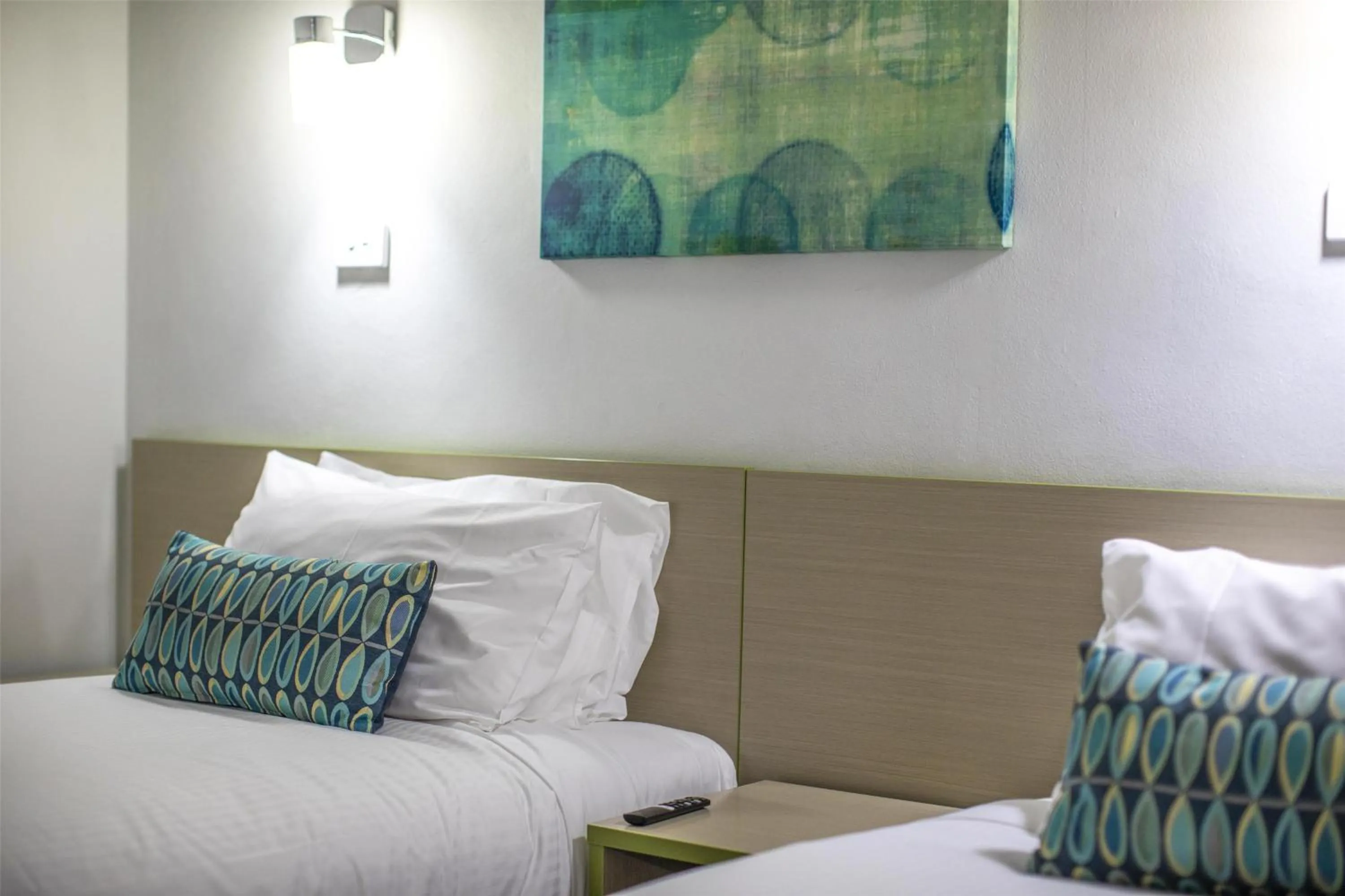 Bedroom, Bed in Nightcap at Skyways Hotel