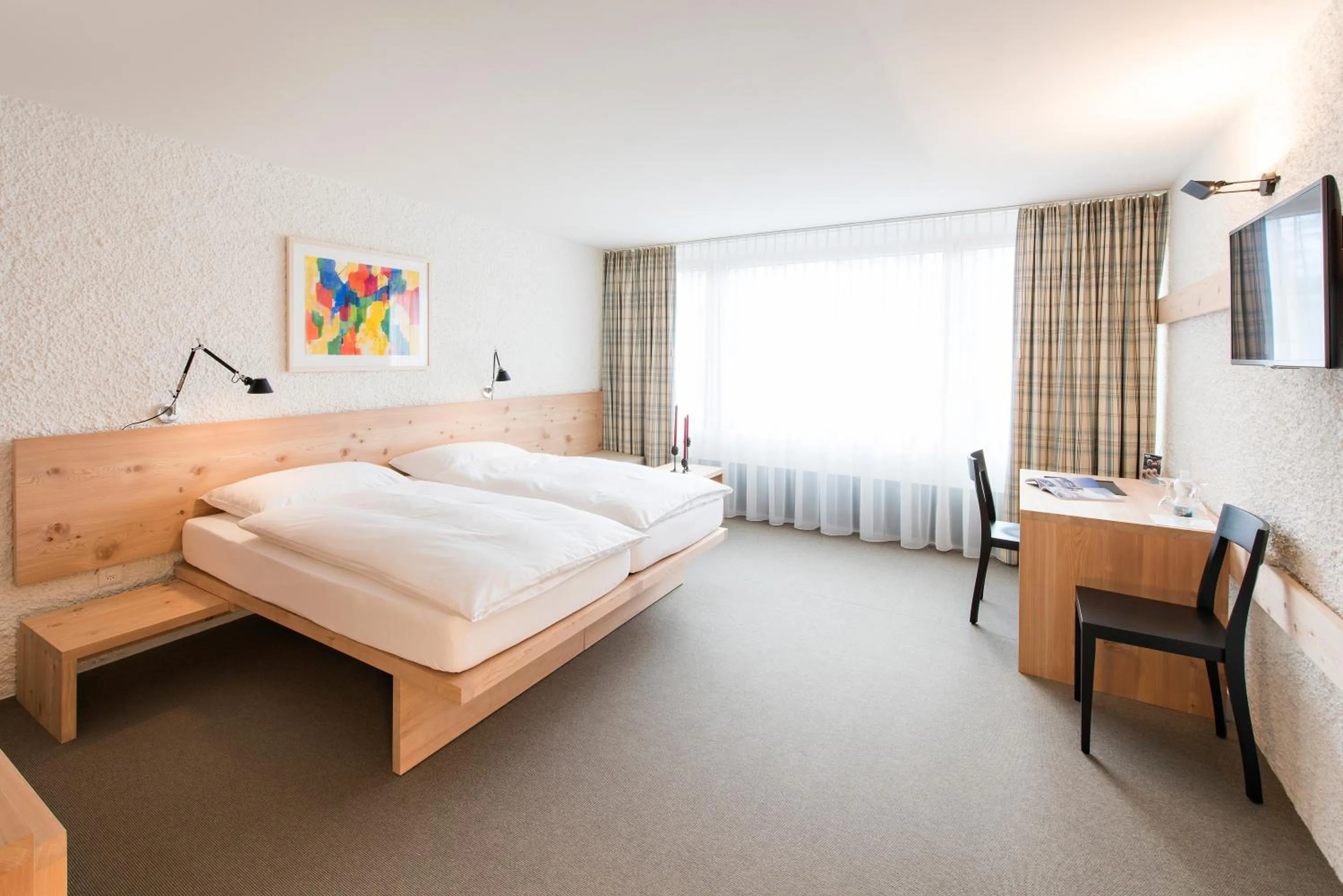 Bed in Hauser Hotel St. Moritz