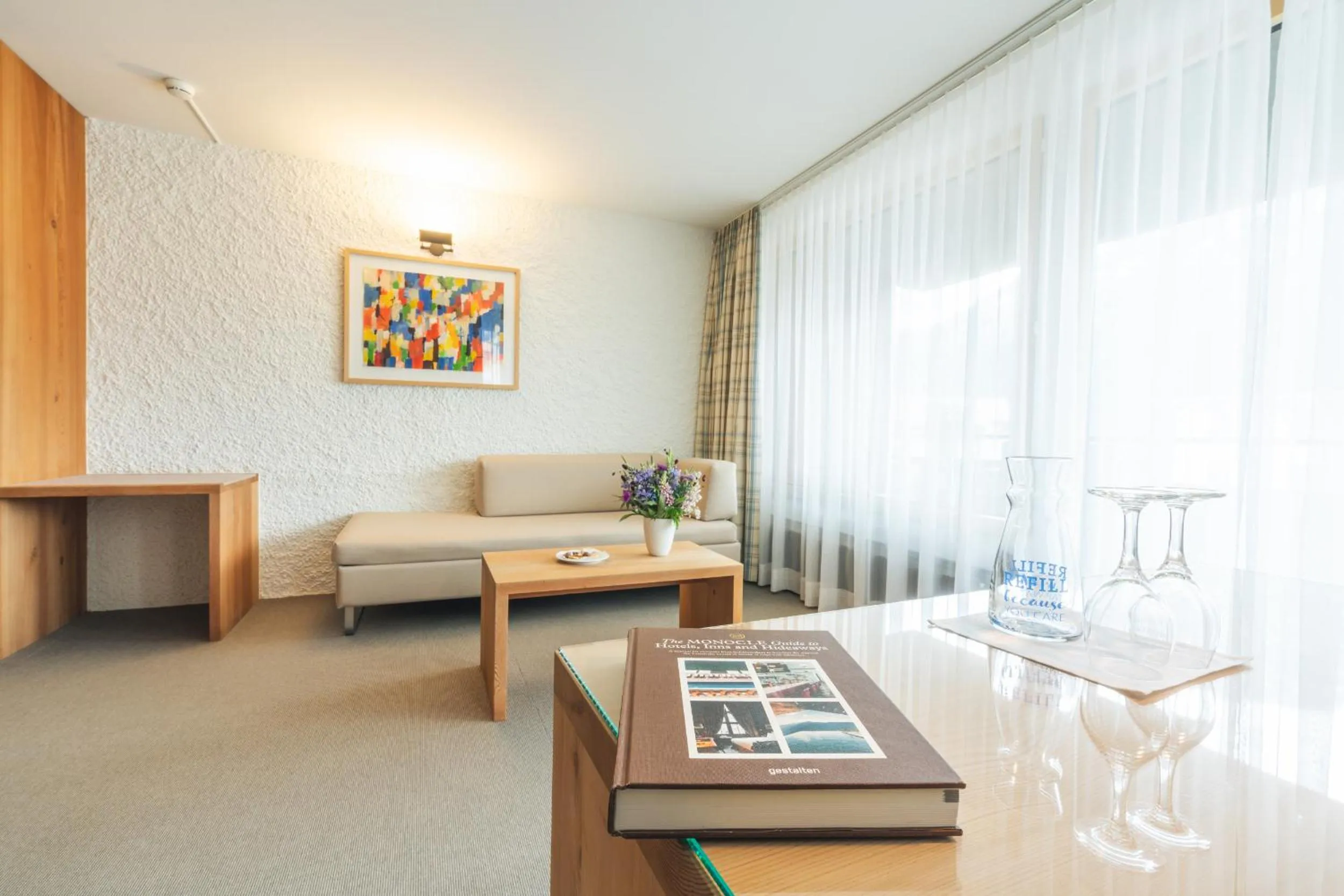 Living room in Hauser Hotel St. Moritz