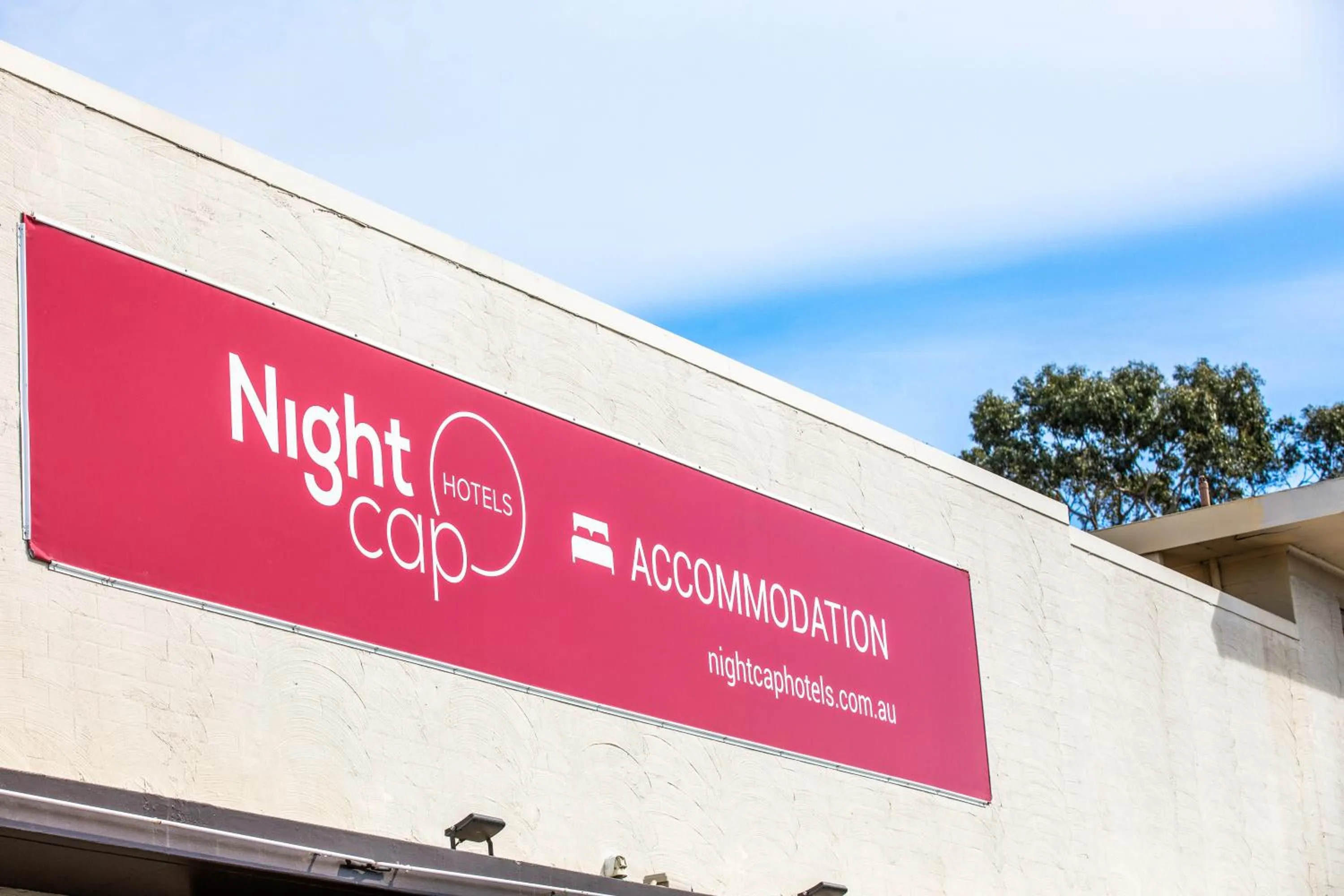 Property logo or sign in Nightcap at Carlyle Hotel