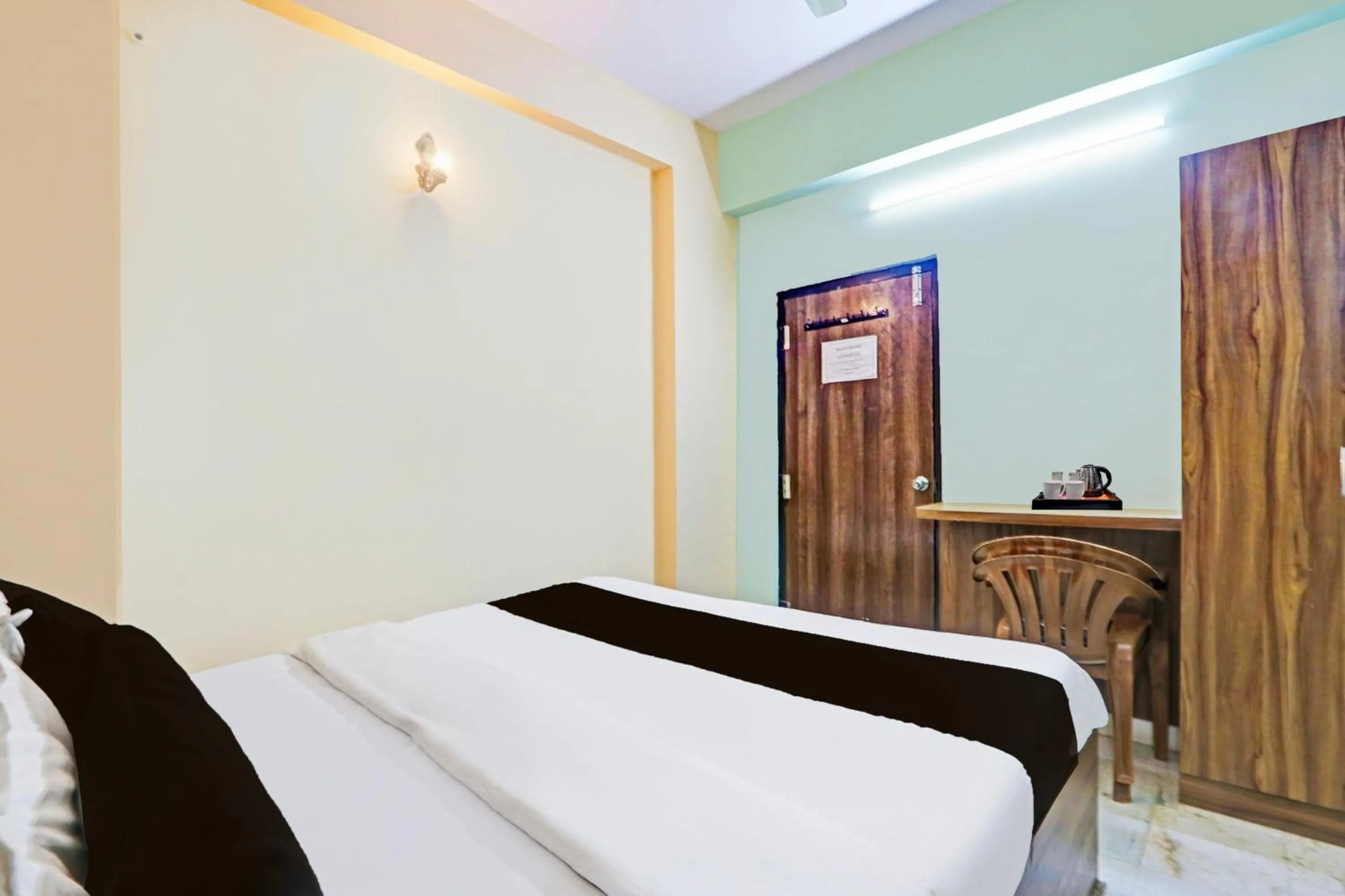 Bedroom, Bed in Super Hotel O Karimnagar