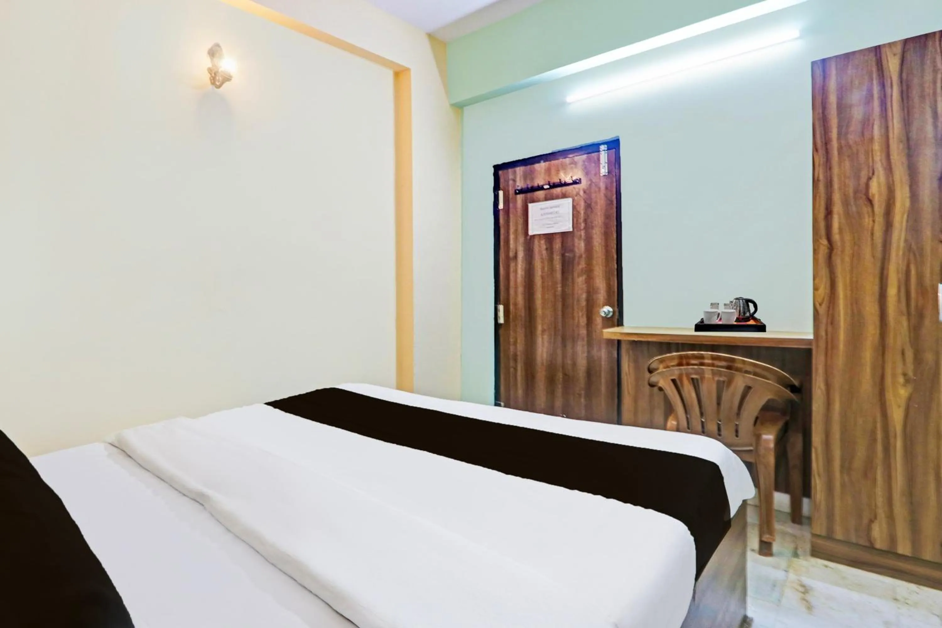 Bedroom, Bed in Super Hotel O Karimnagar