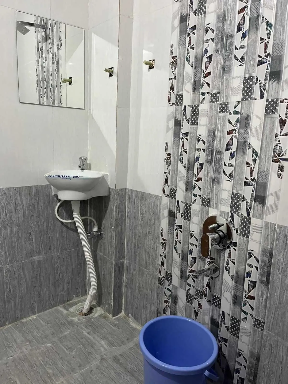 Bathroom in Hotel O Pravin Executive