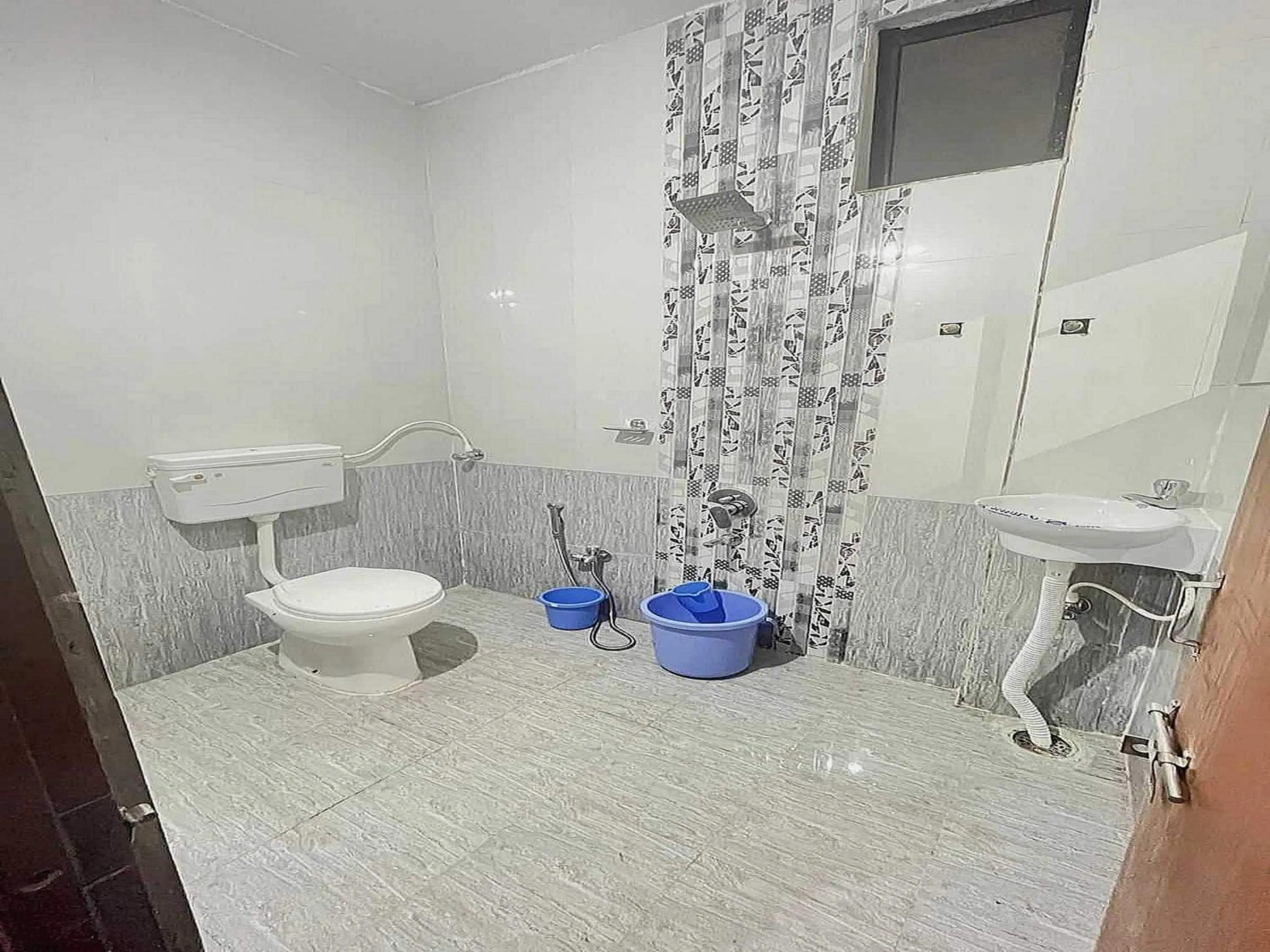 Bathroom in Hotel O Pravin Executive