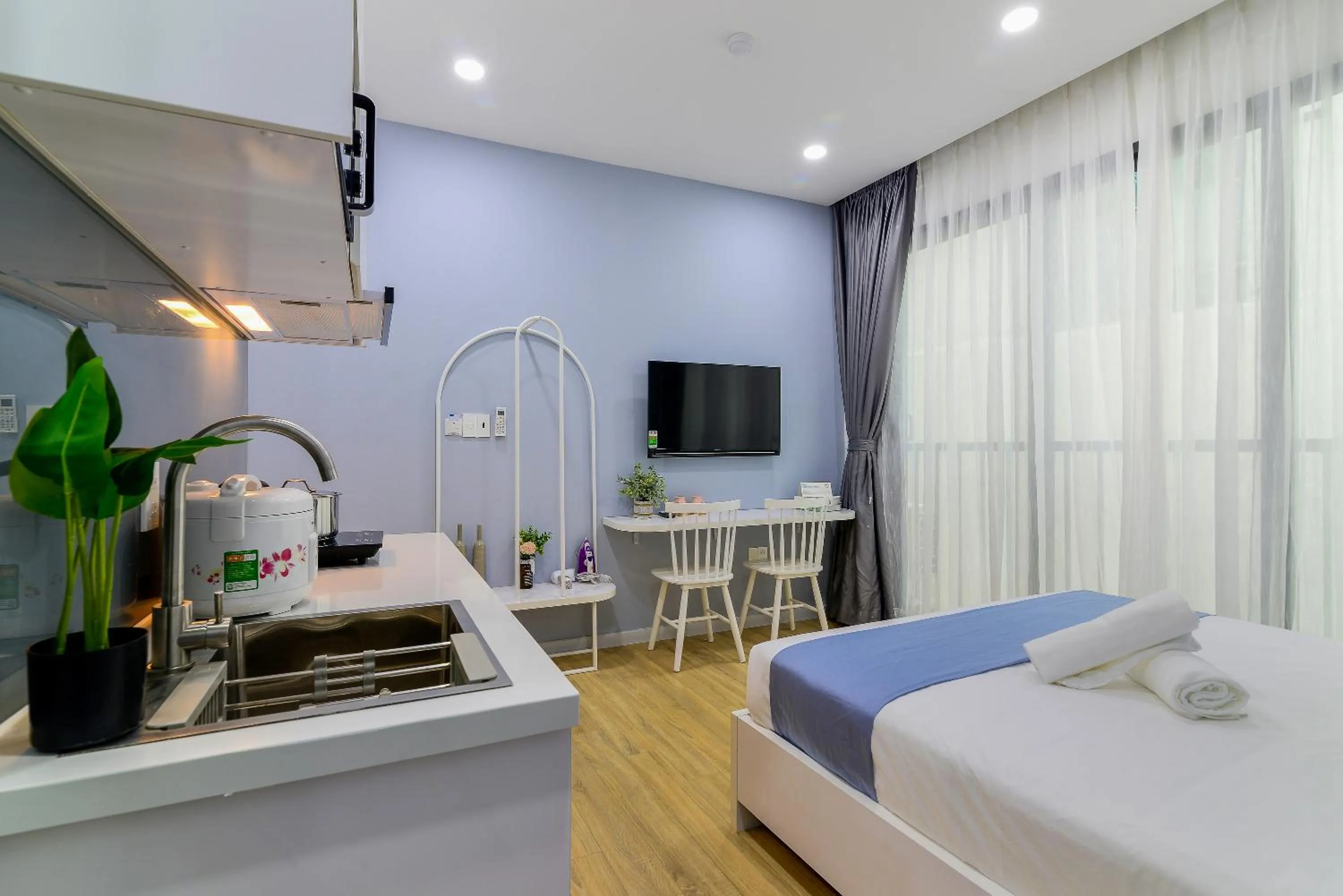 Living room, Bed in Cozrum Homes - Saphera Residence