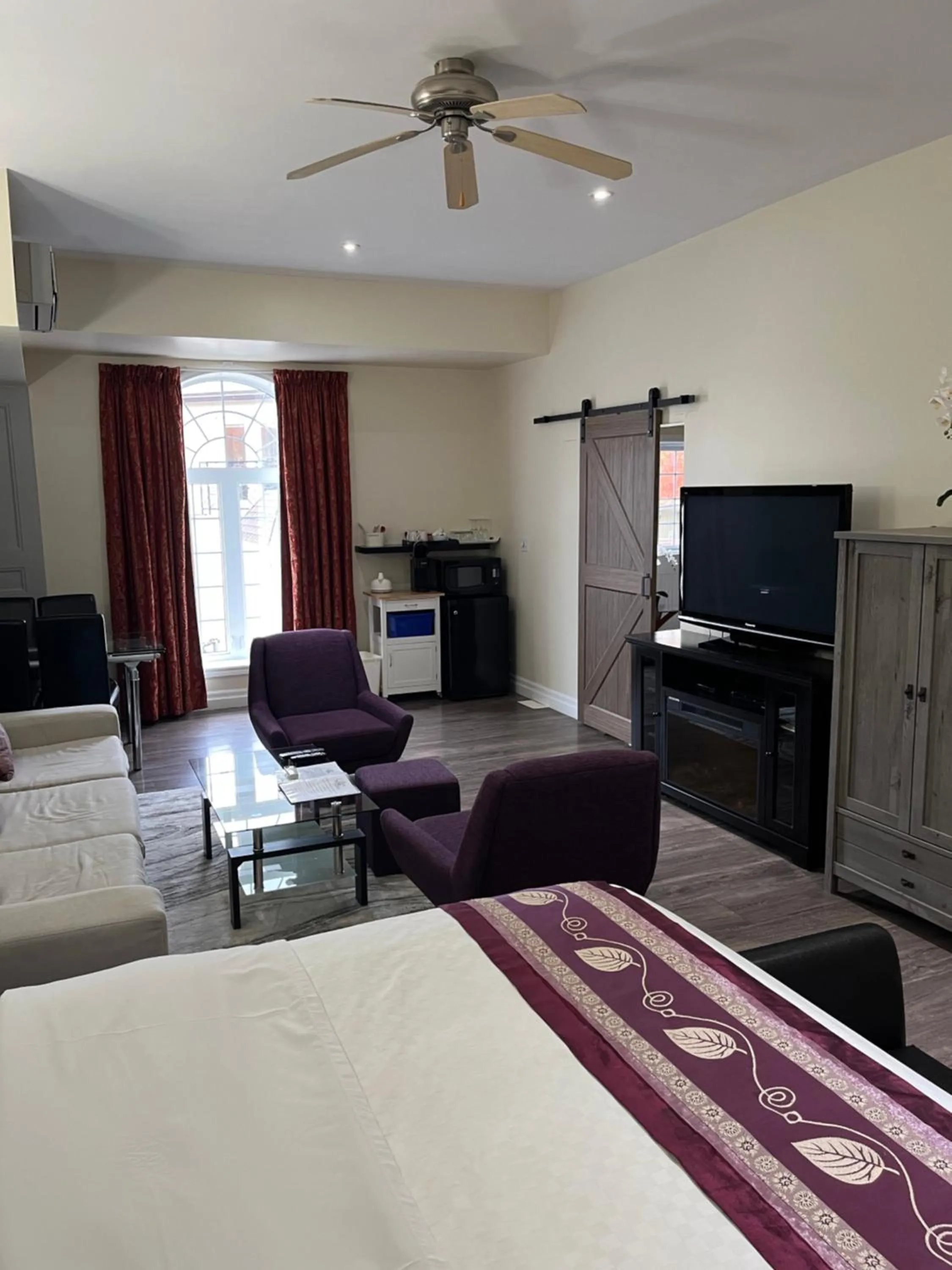 Bed in Grey Rose Suites