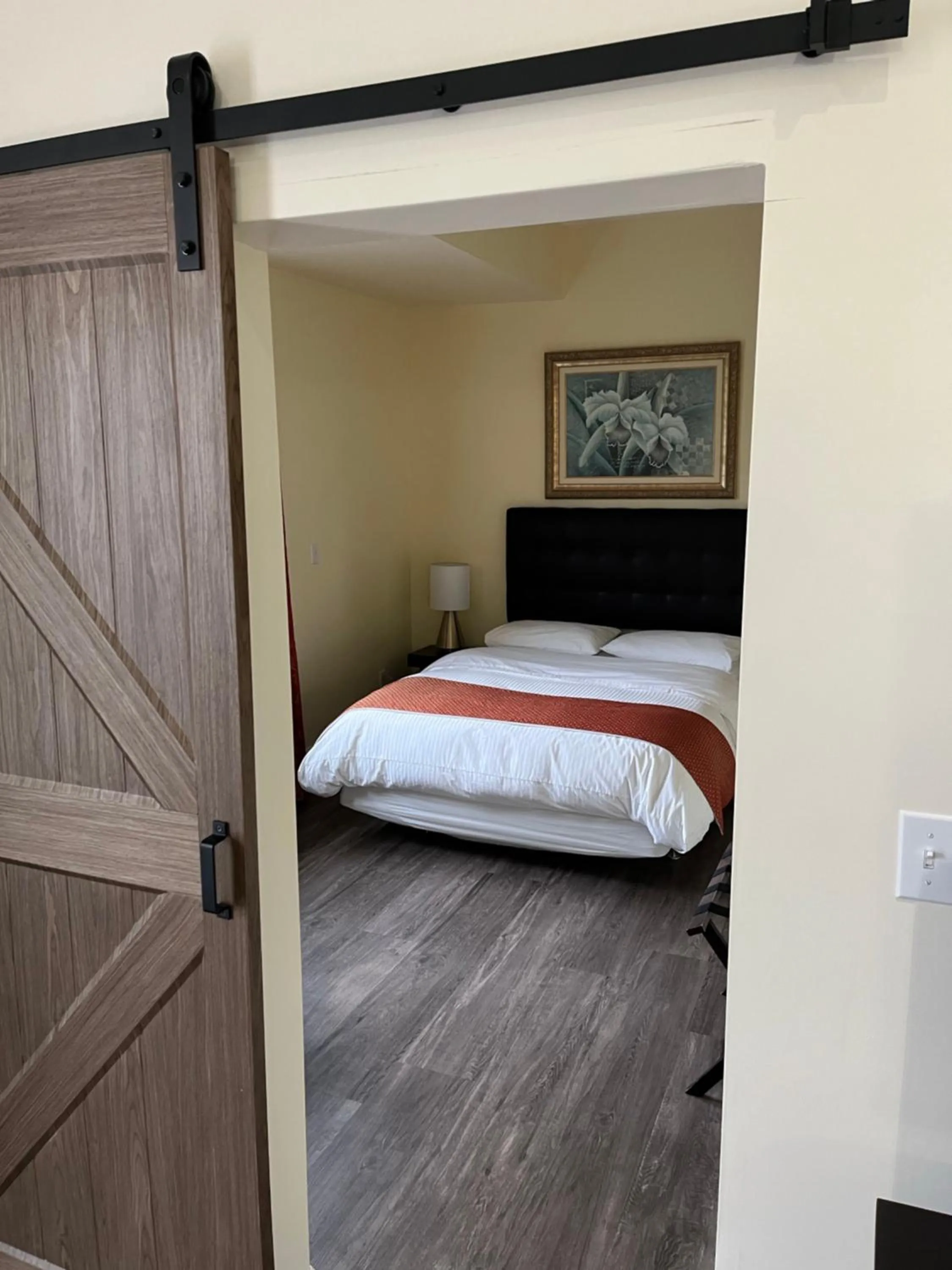 Bed in Grey Rose Suites