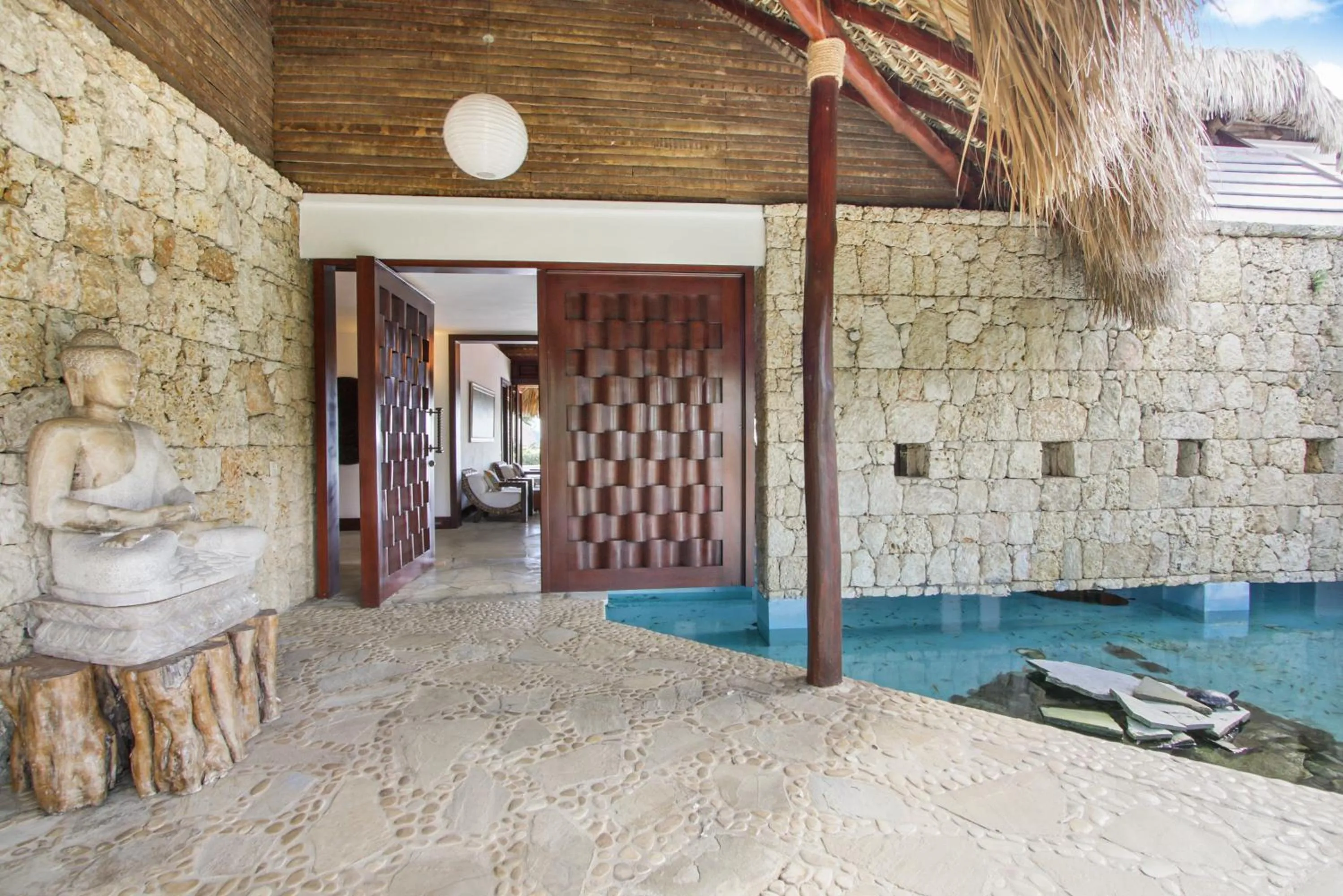 Facade/entrance in Unique Villa with Ocean and River Views - Staff & Golf Carts