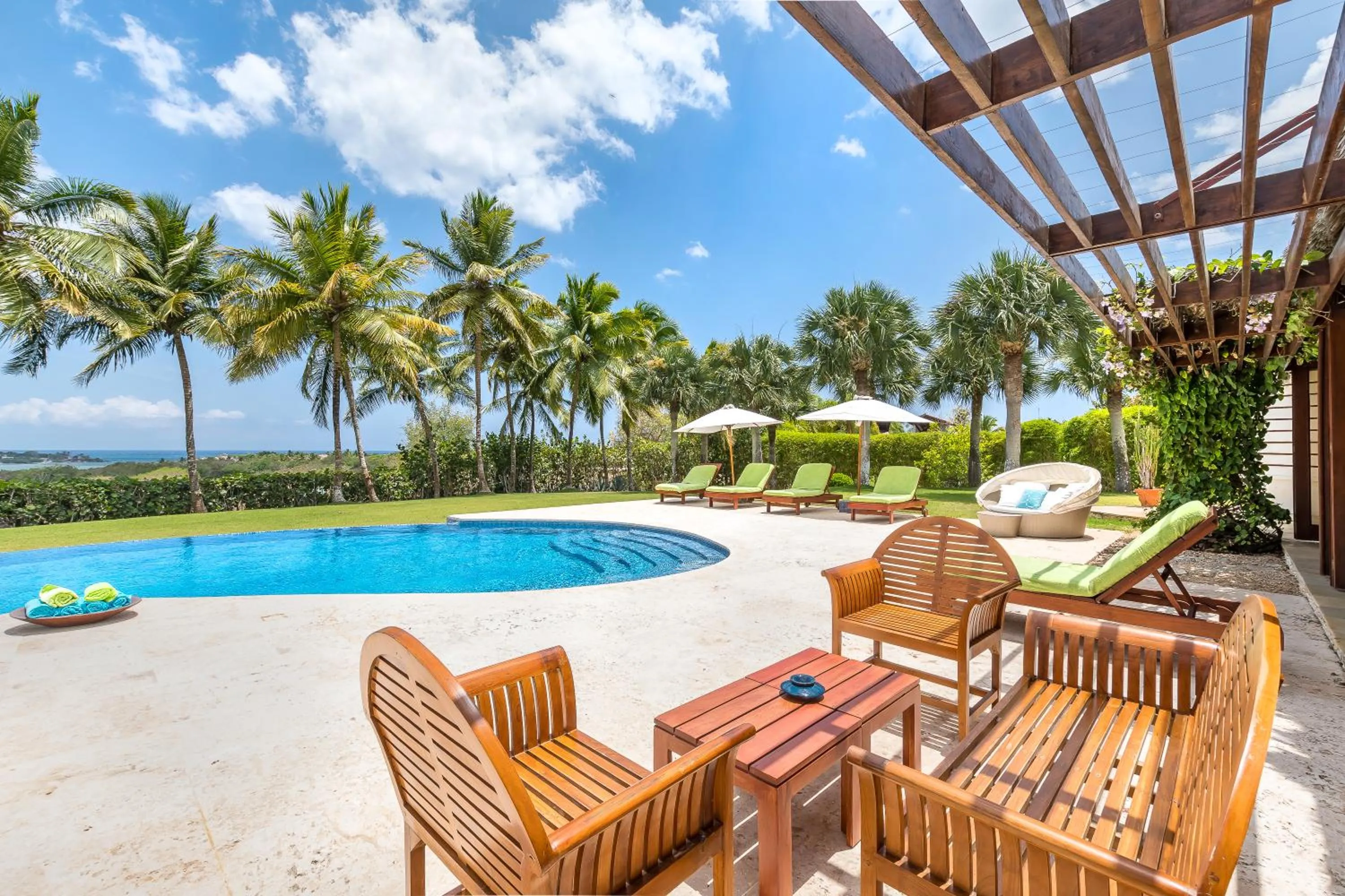 Patio in Unique Villa with Ocean and River Views - Staff & Golf Carts