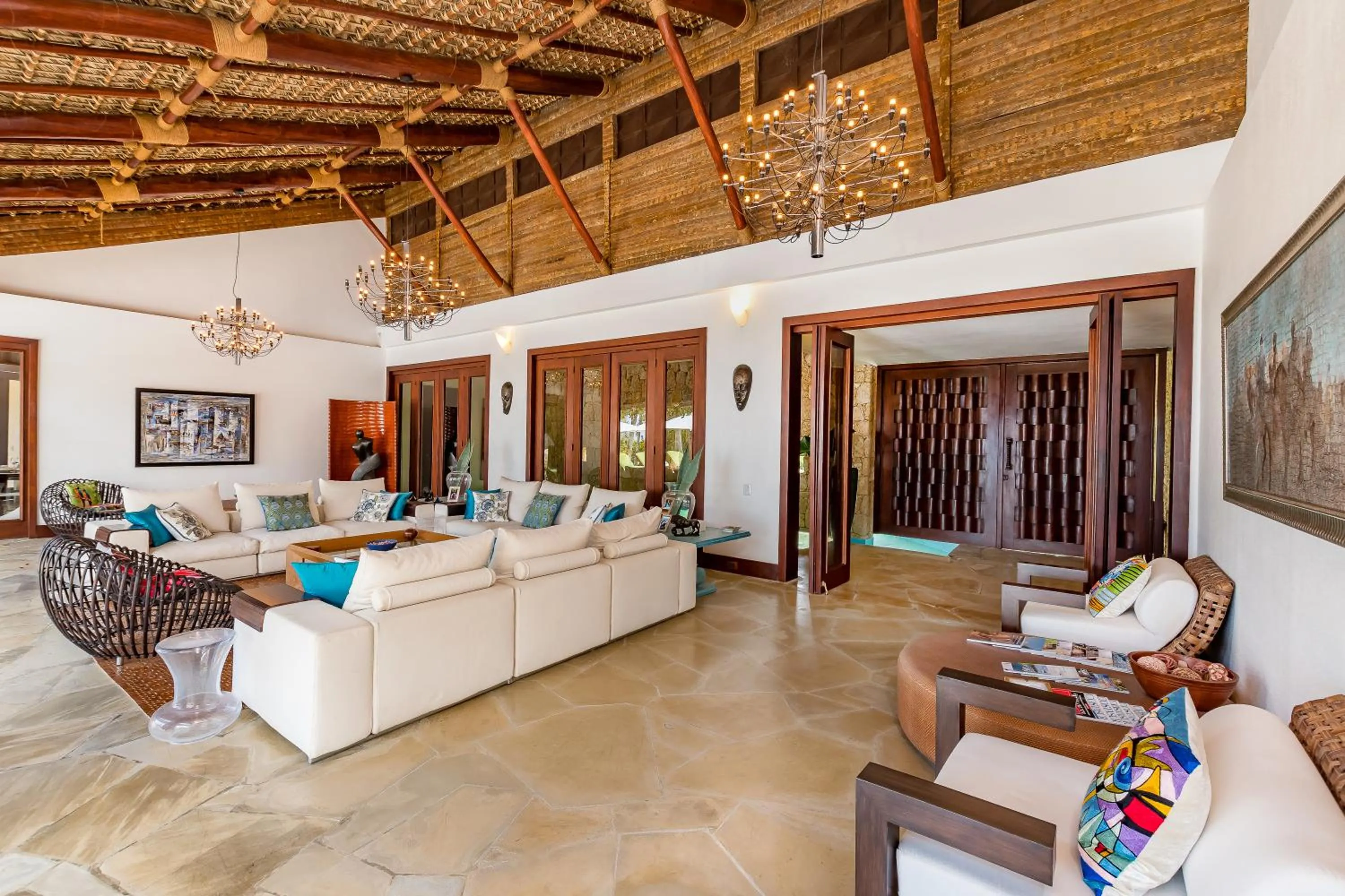 Living room in Unique Villa with Ocean and River Views - Staff & Golf Carts