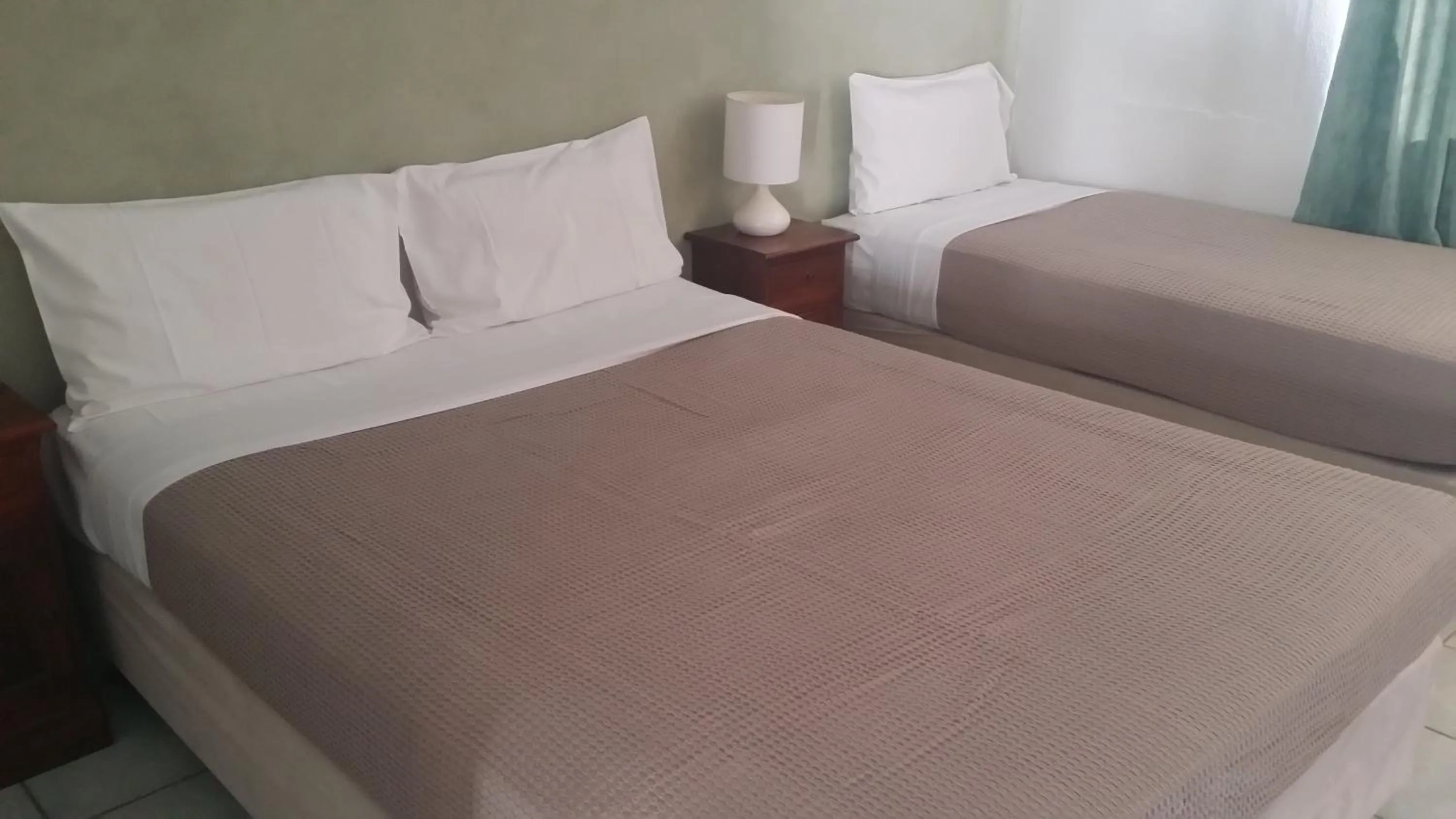 Bed in Mackay Motor Inn