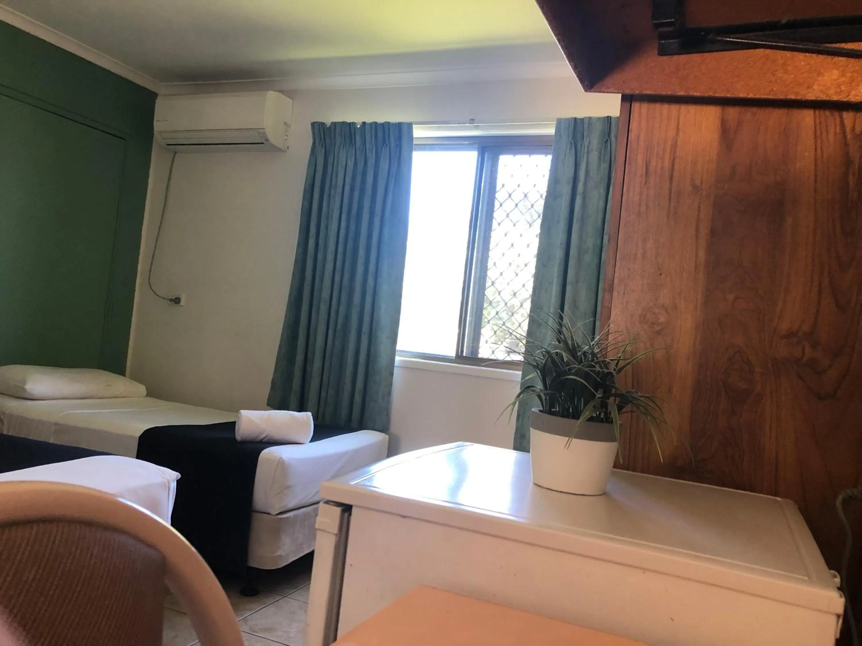 Bed in Mackay Motor Inn