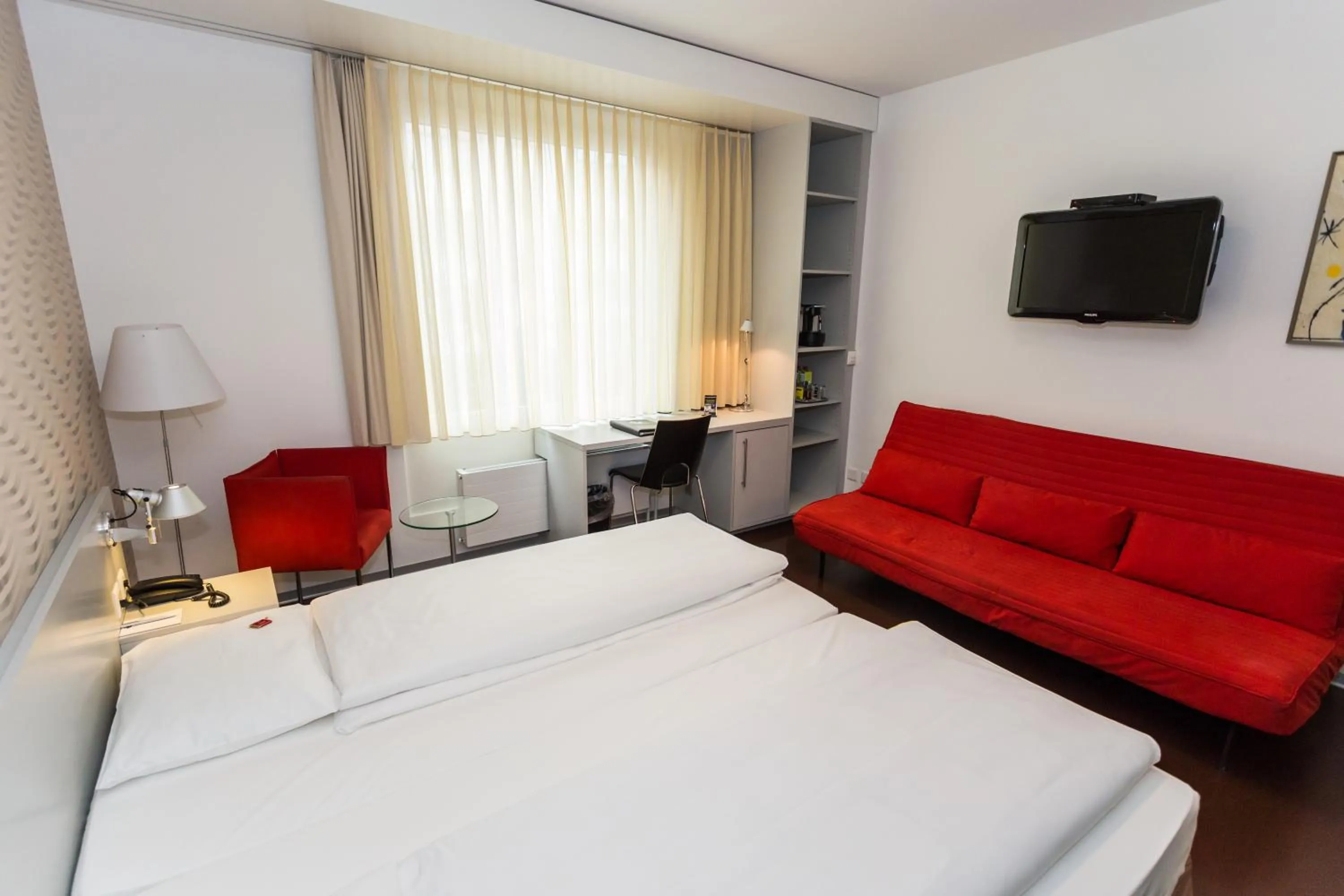 Photo of the whole room, Bed in Sorell Business Hotel Ador Bern