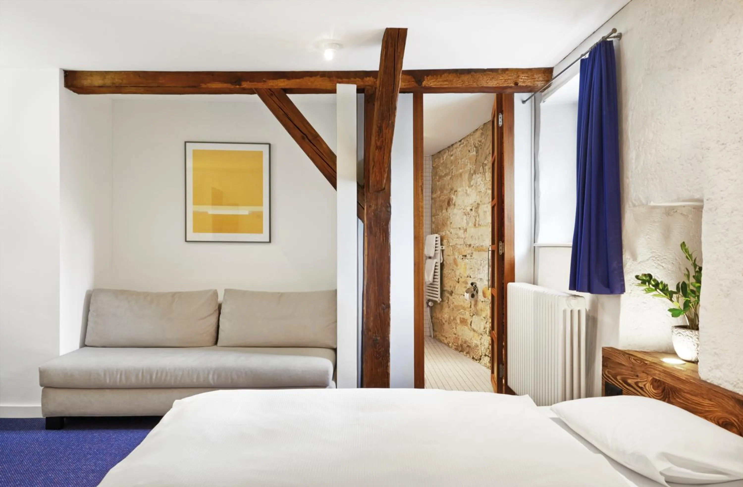 Bed in Boutique-Hotel Rüden