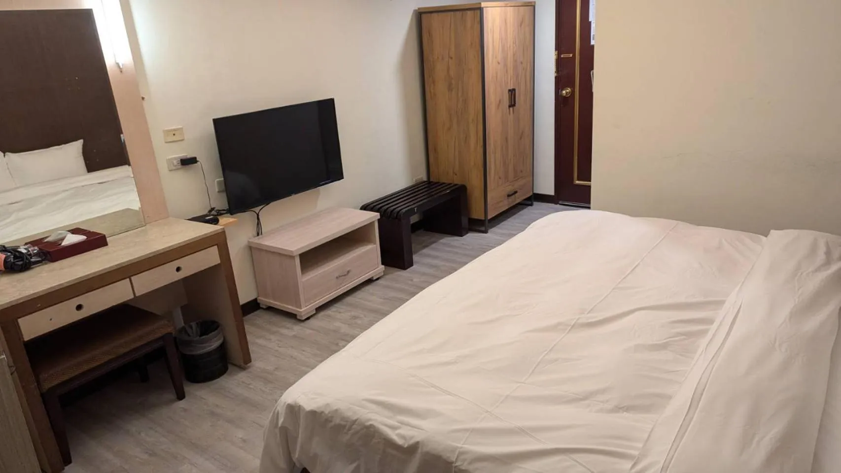 Bed in Waugh Den Business Hotel