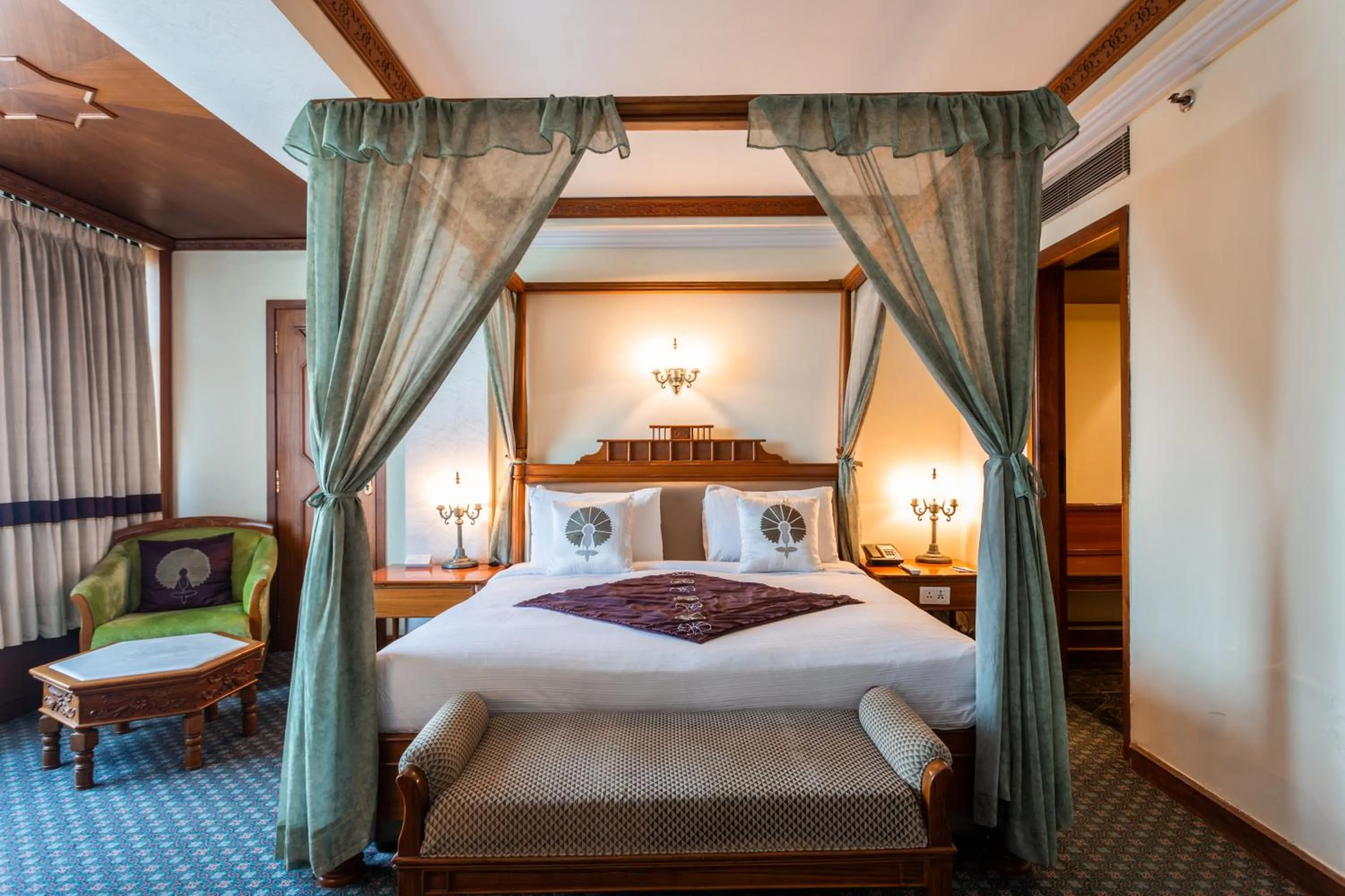 Bed in The Maya Hotel