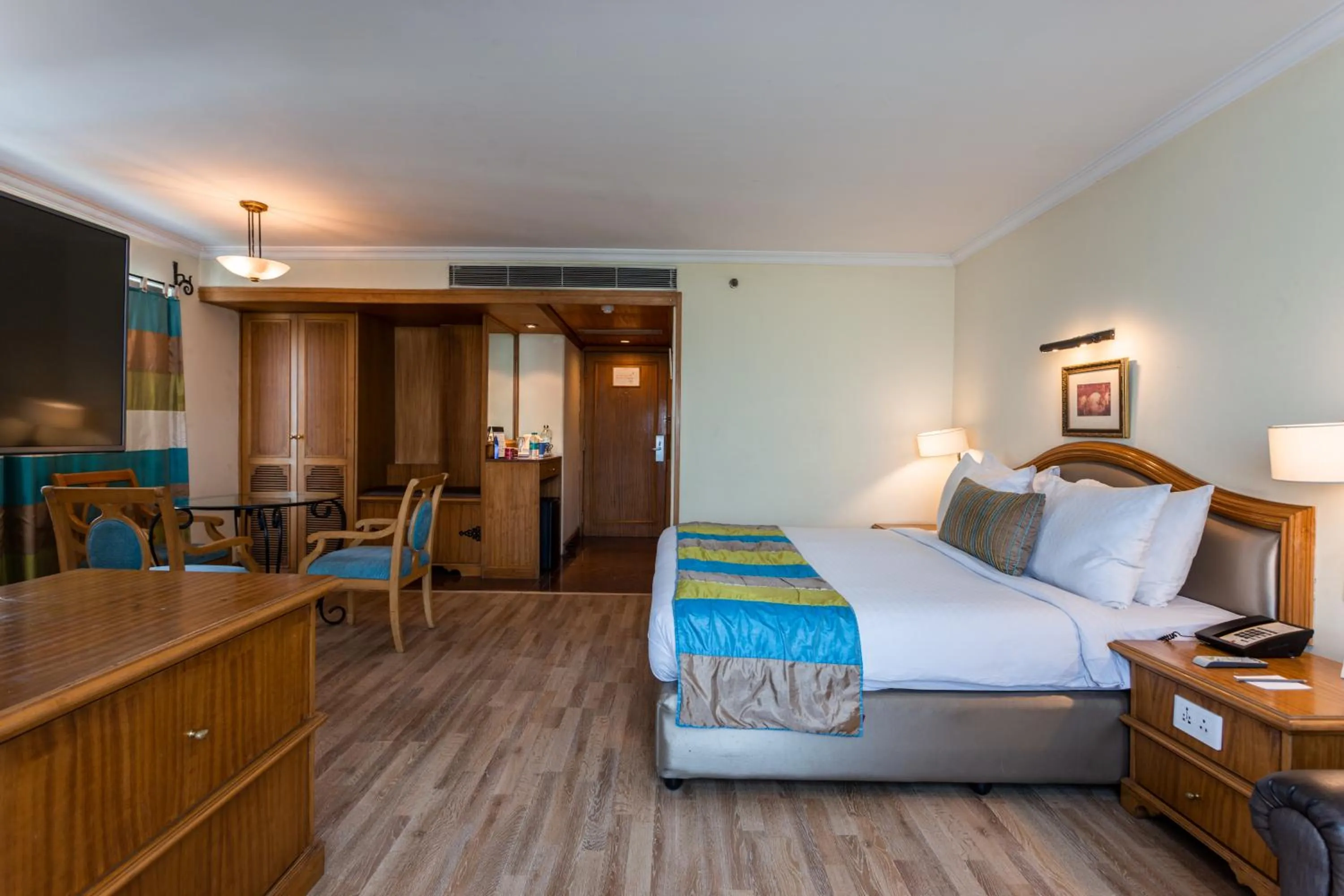 Bed in The Maya Hotel