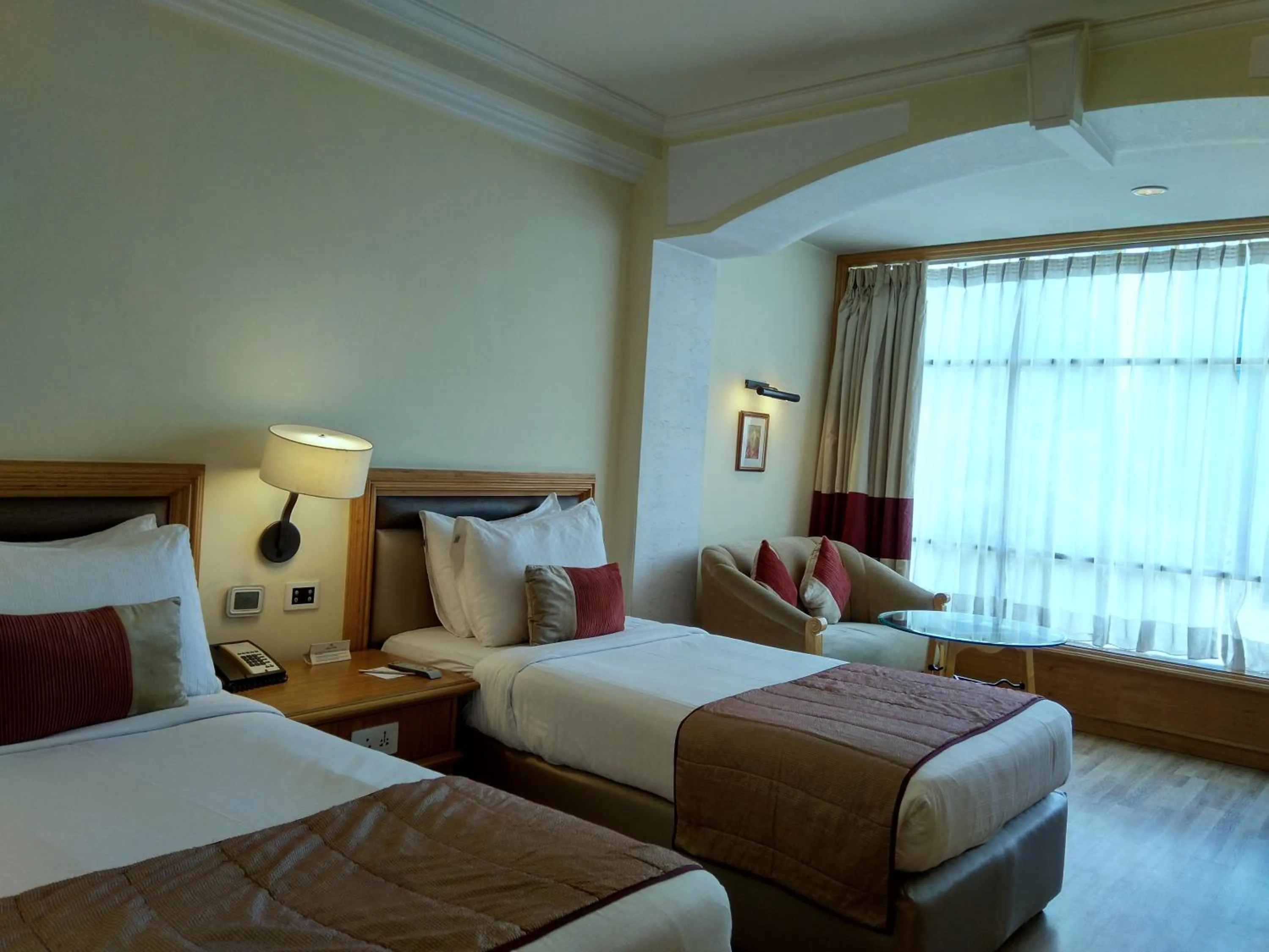 Bed in The Maya Hotel