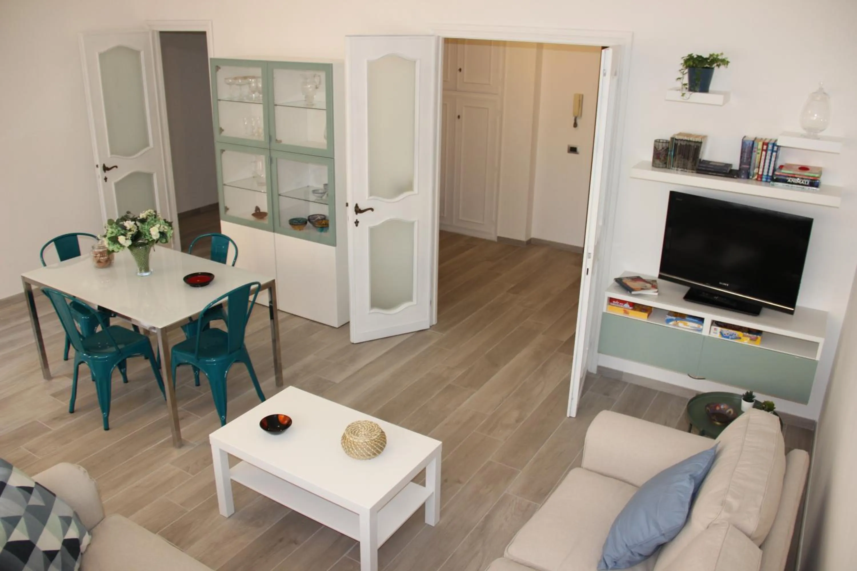 Communal lounge/ TV room in Appartamento Via dei Fabbri Navali