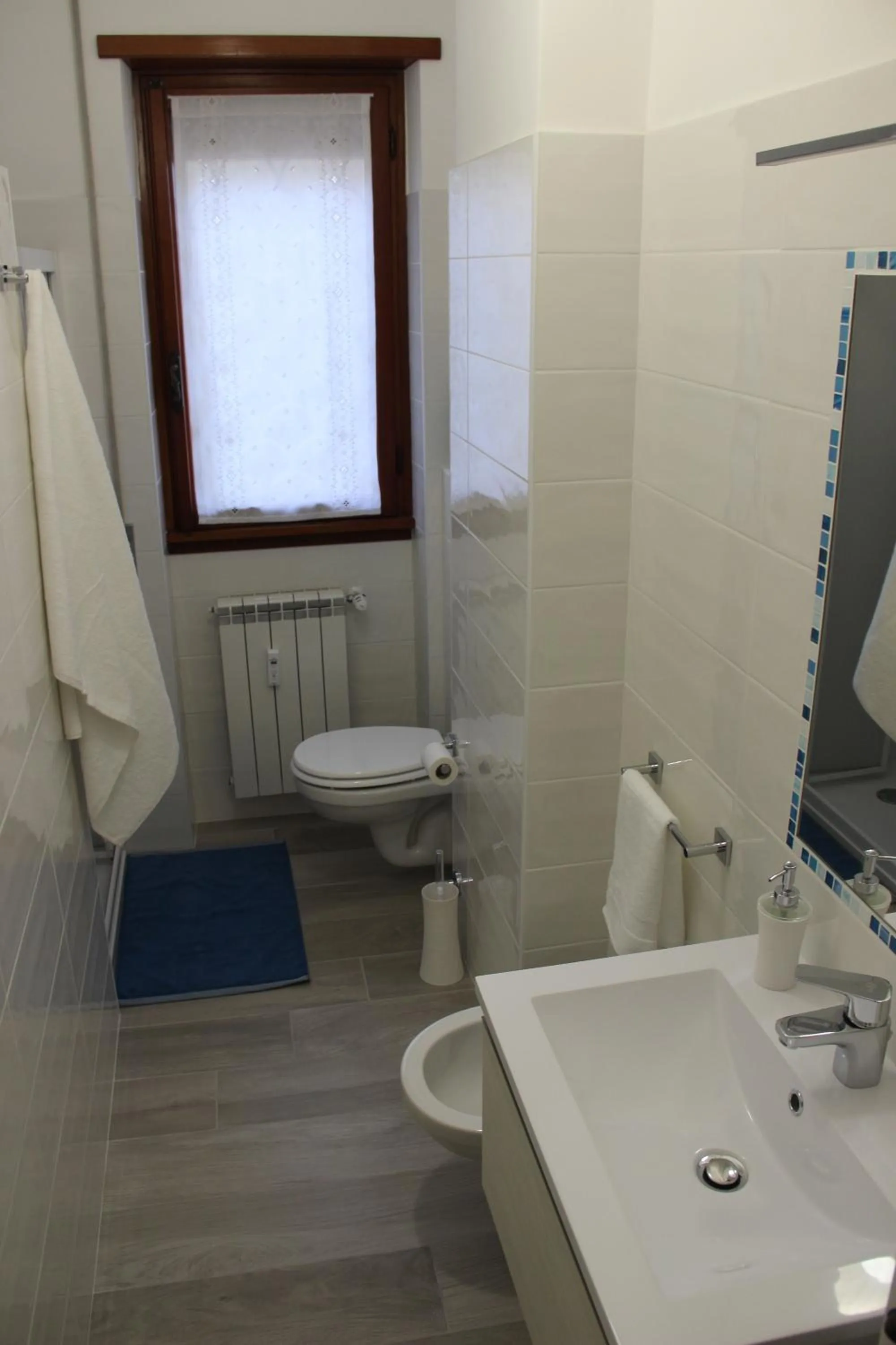 Toilet in Appartamento Via dei Fabbri Navali