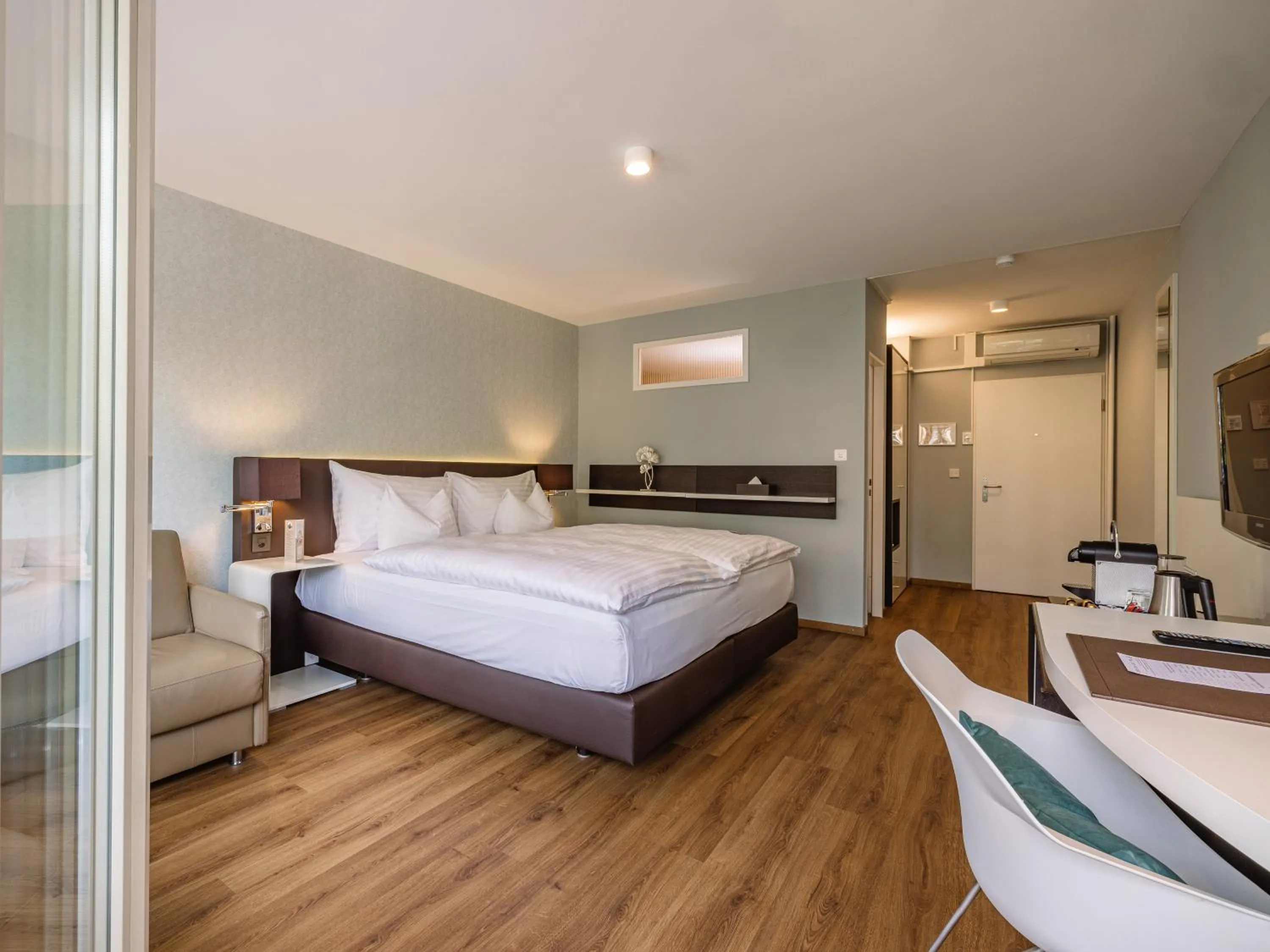 Photo of the whole room, Bed in Hotel Spalentor - Ihr sympathisches Stadthotel