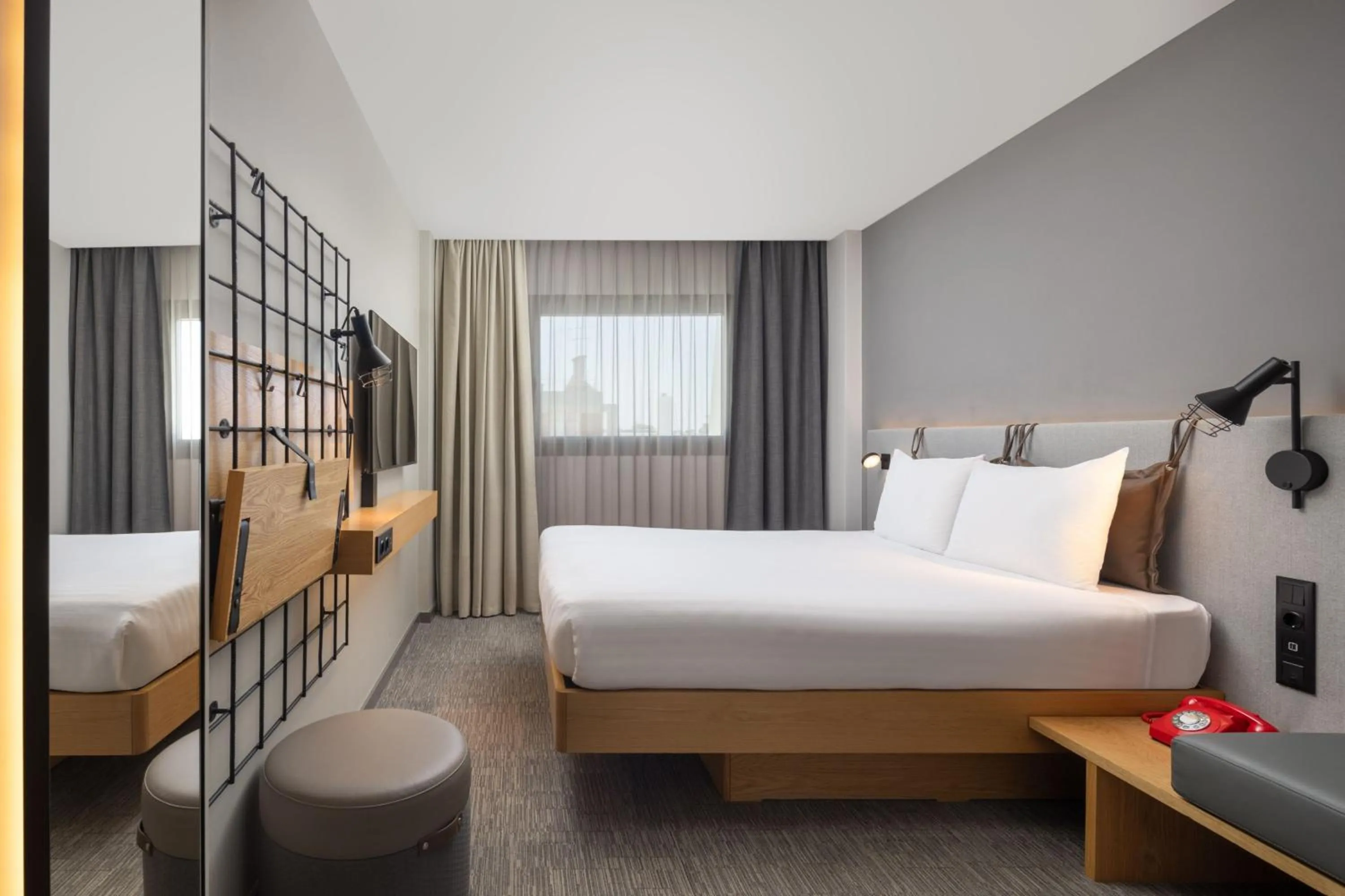 Photo of the whole room, Bed in Moxy Lisbon City