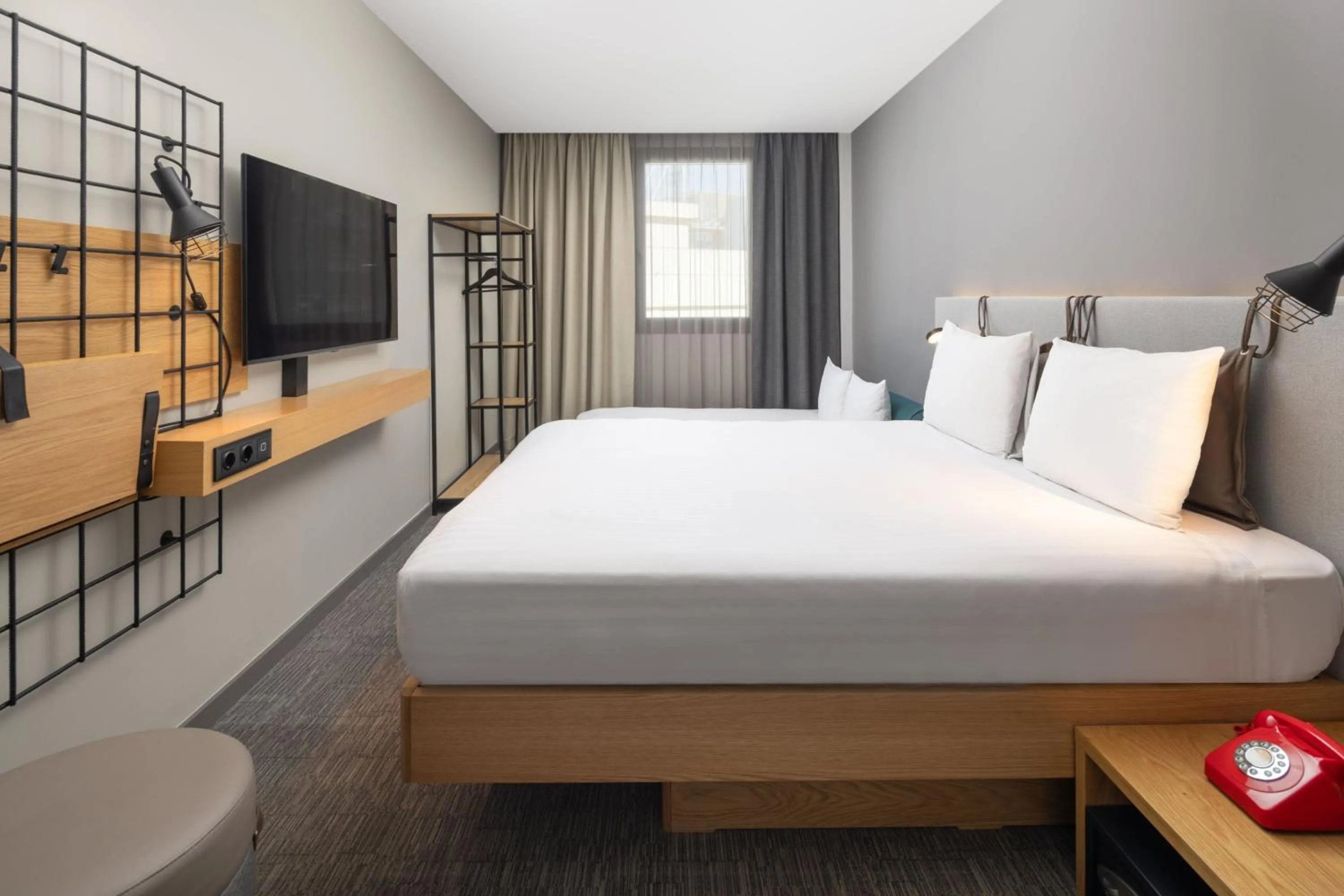 Photo of the whole room, Bed in Moxy Lisbon City