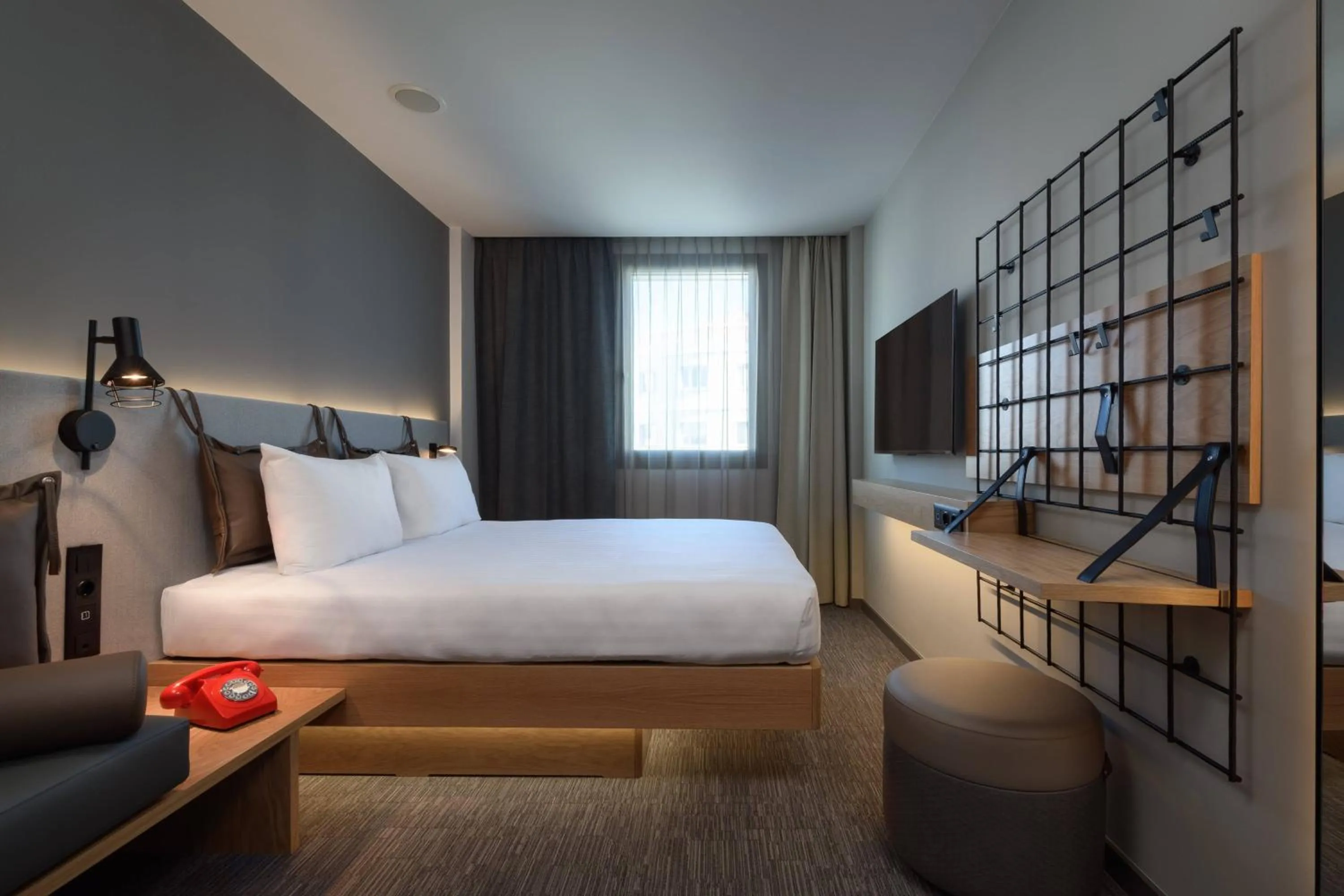 Photo of the whole room, Bed in Moxy Lisbon City