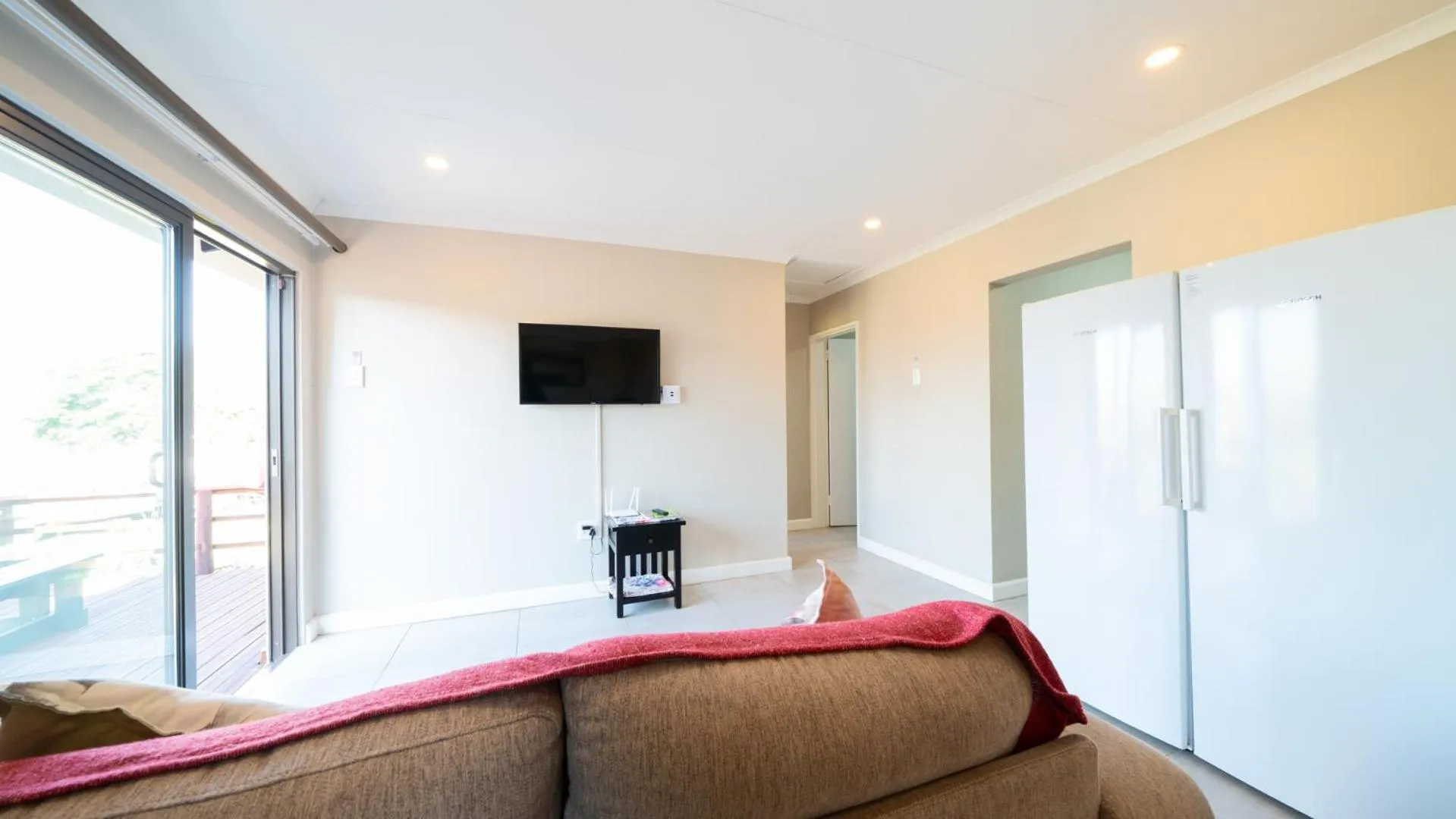 Communal lounge/ TV room in Equestre BnB