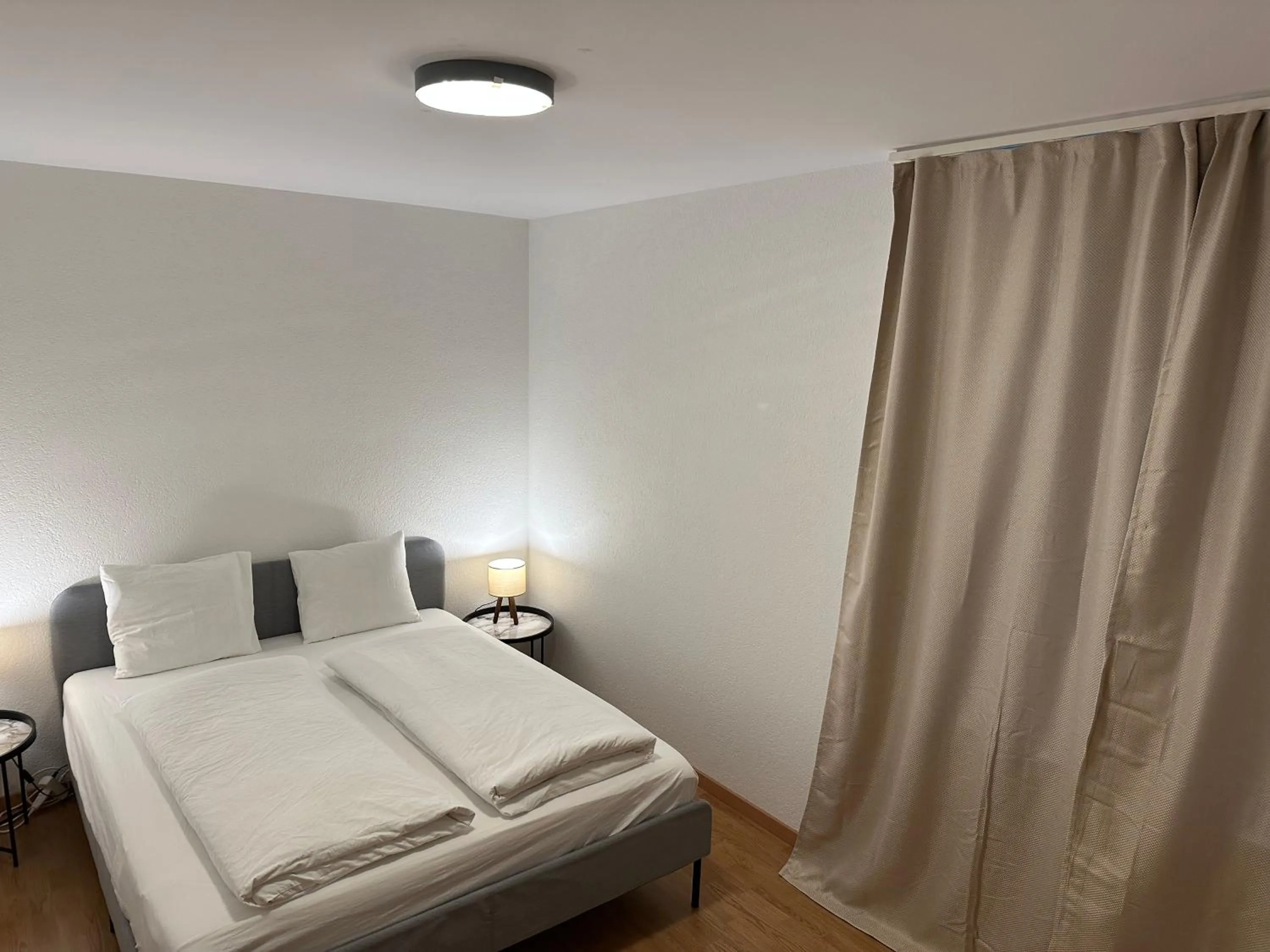 Bed in Galaxy Apartments Lucerne