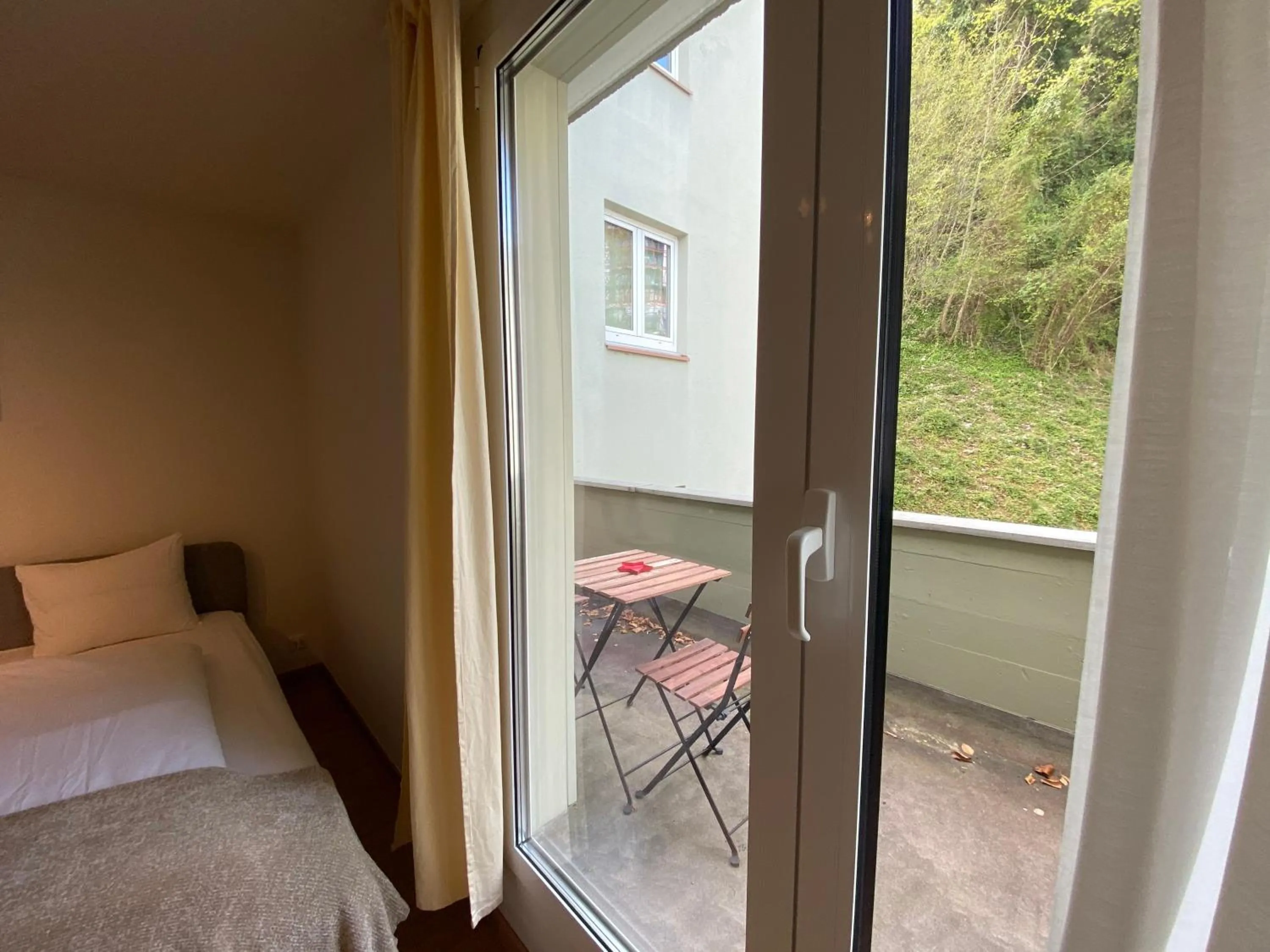 Bed in Galaxy Apartments Lucerne