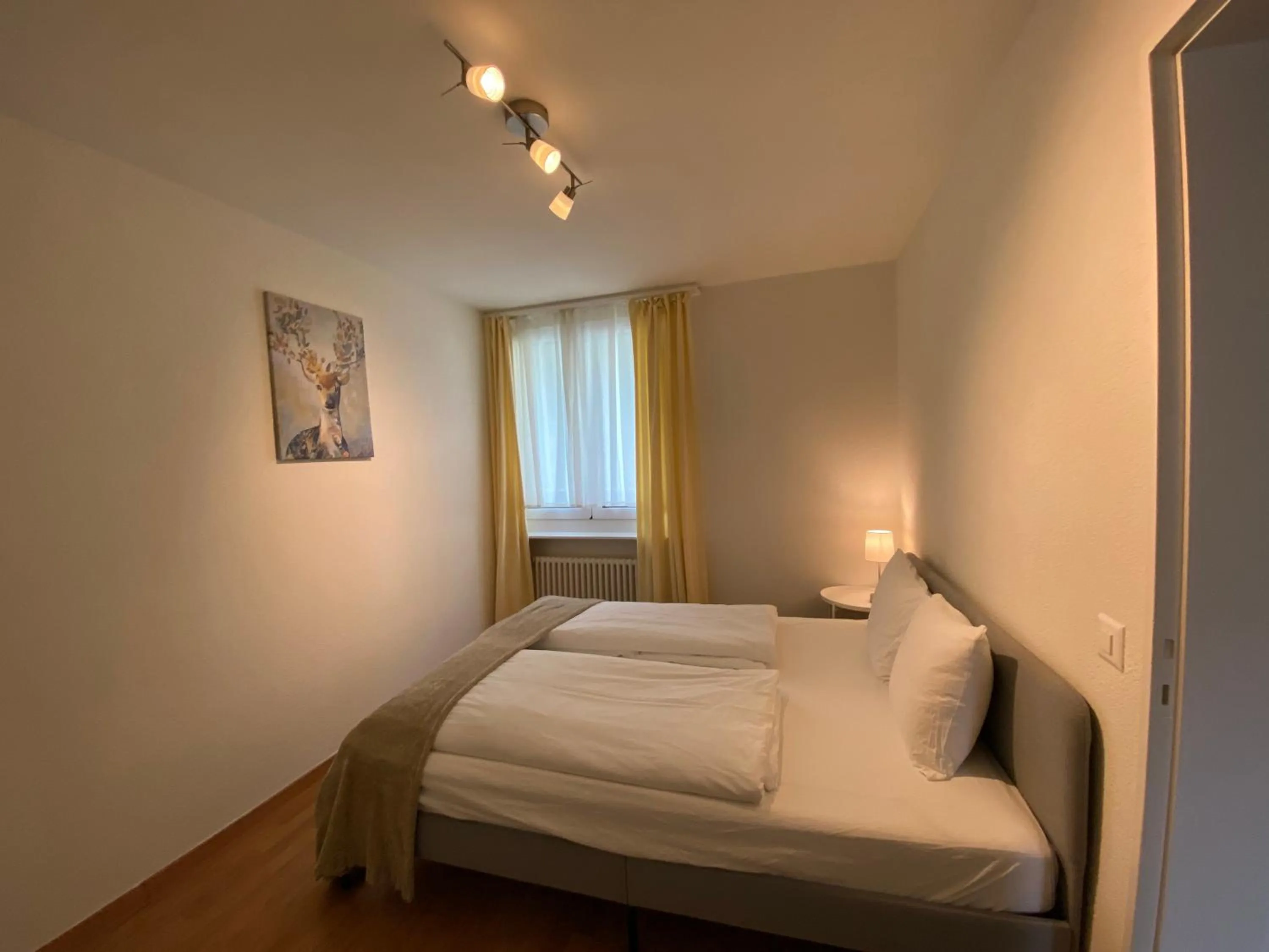 Bed in Galaxy Apartments Lucerne