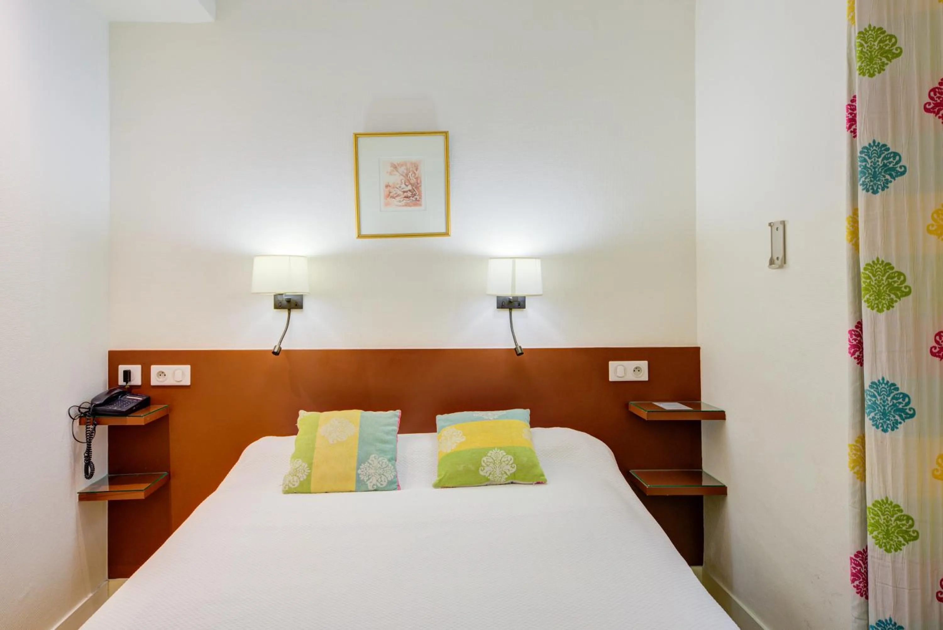 Bed in Hôtel La Sanguine