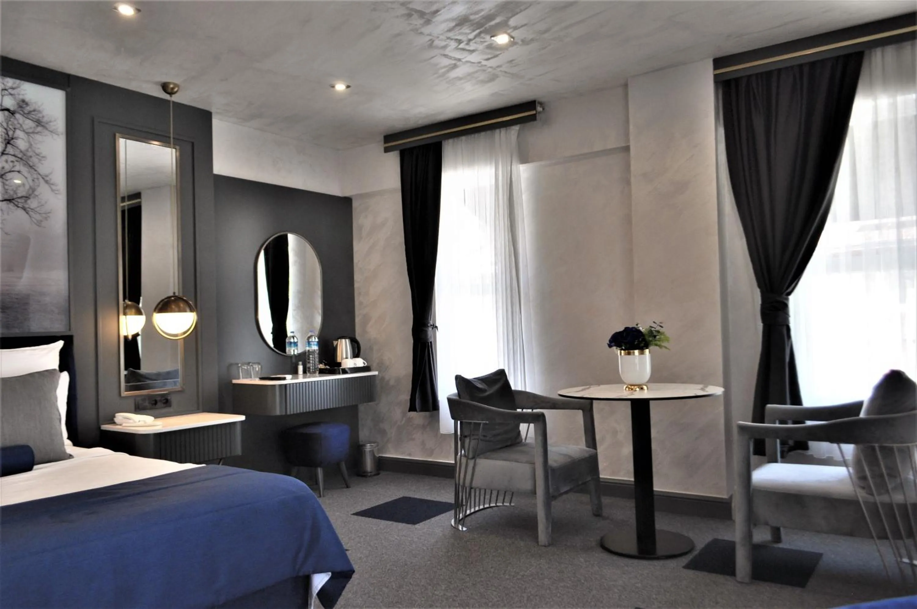 Seating area, Bed in Skopea Inn Exclusive Hotel