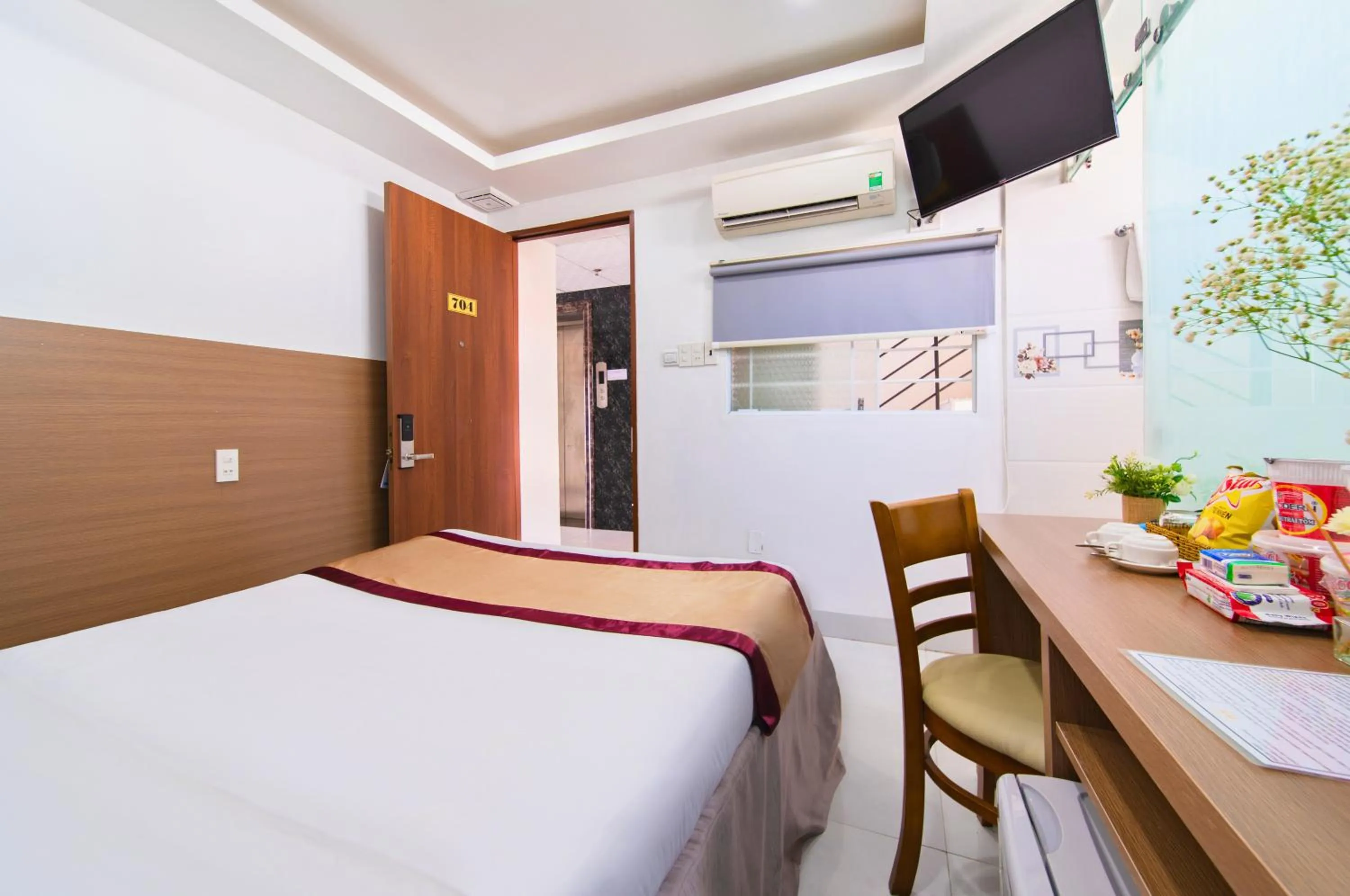 Bed in Arise Seaside Hotel