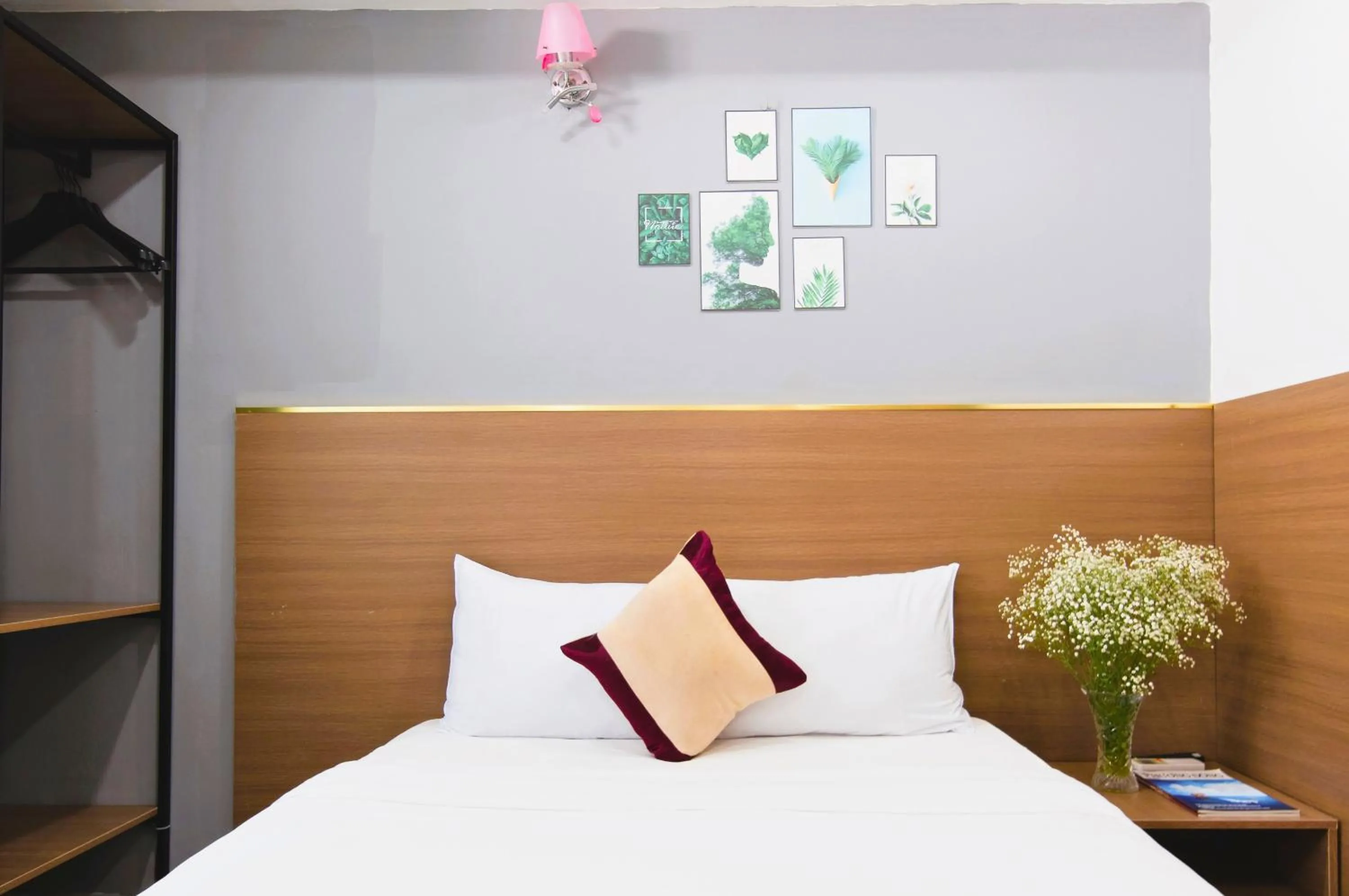 Bed in Arise Seaside Hotel