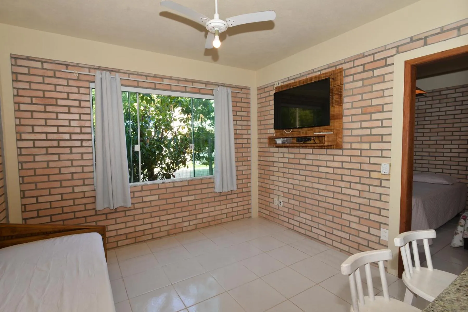 TV and multimedia in Pousada Sítio Olho D'Água