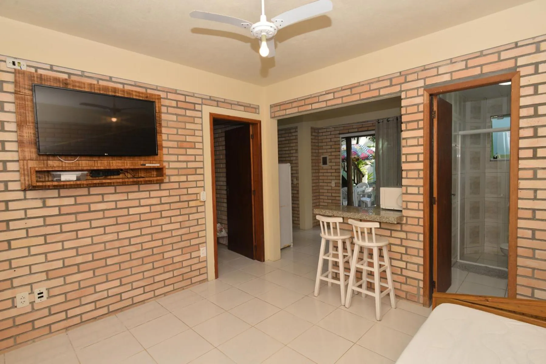 TV and multimedia in Pousada Sítio Olho D'Água